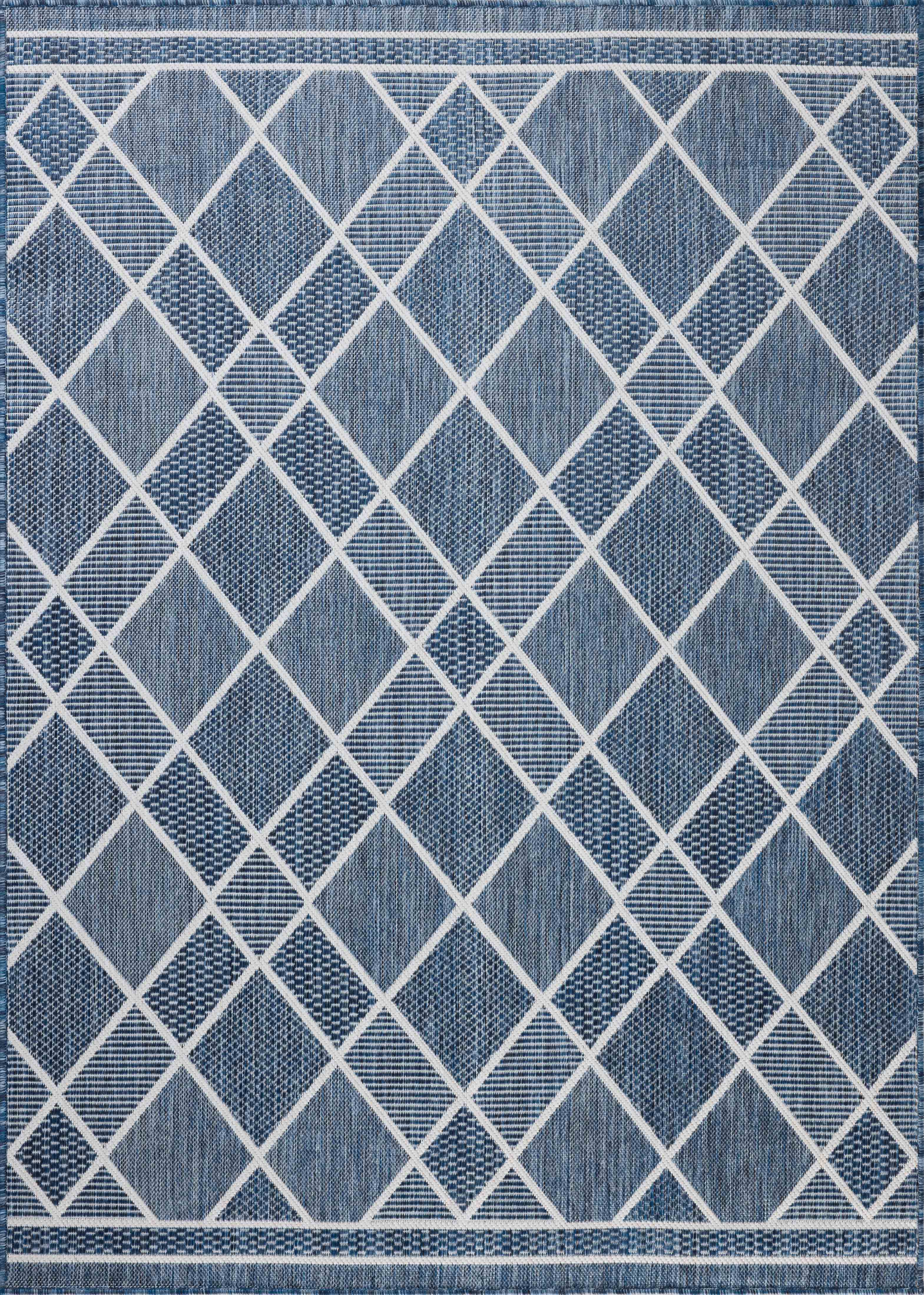 The Easton ESN-08 Ivory / Denim Area Rug offers refined ivory and casual denim sophistication in a power-loomed polypropylene area rug