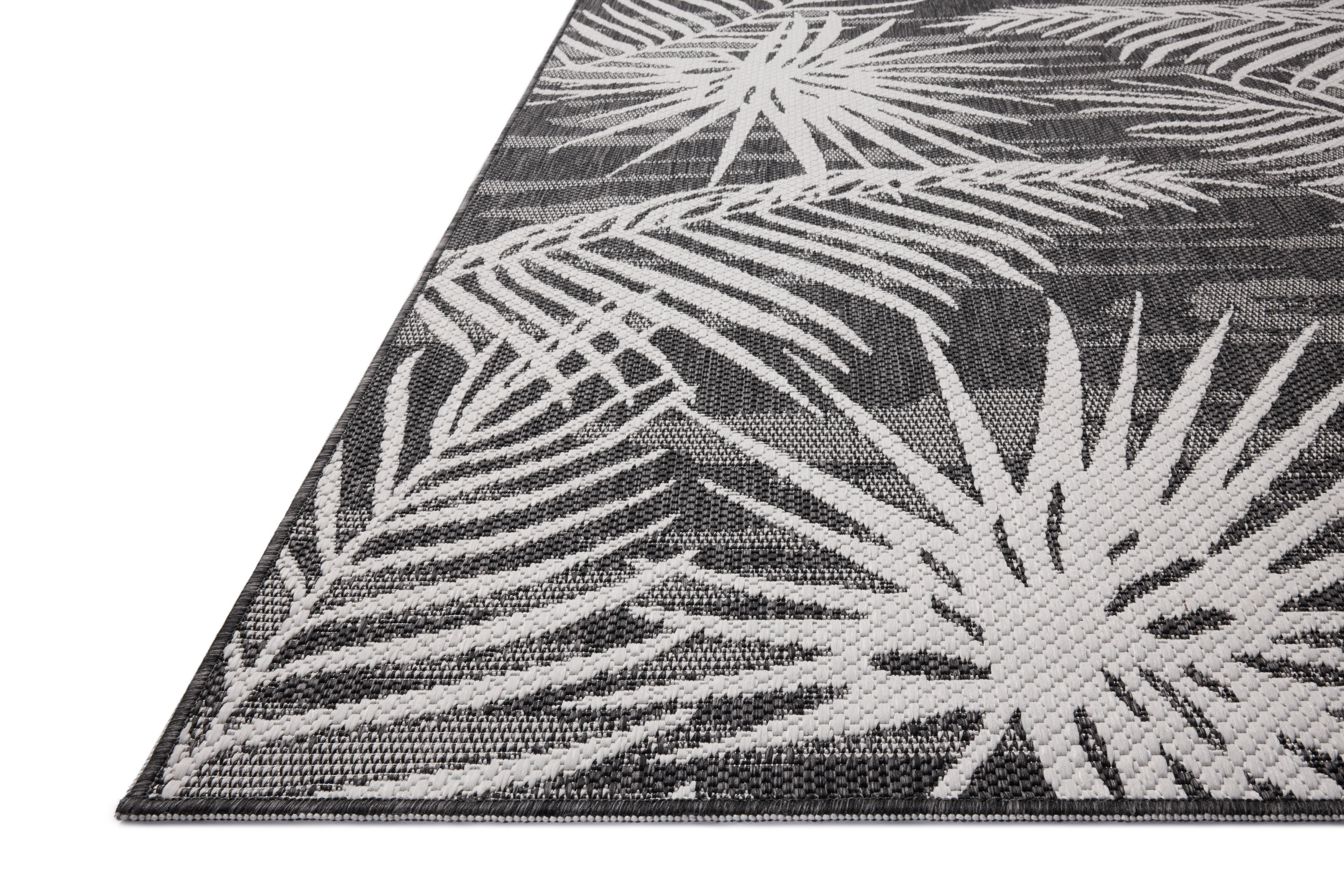 Expertly crafted as a power-loomed polypropylene area rug, the Easton ESN-09 Ivory / Onyx Area Rug captures refined ivory and bold onyx tones beautifully