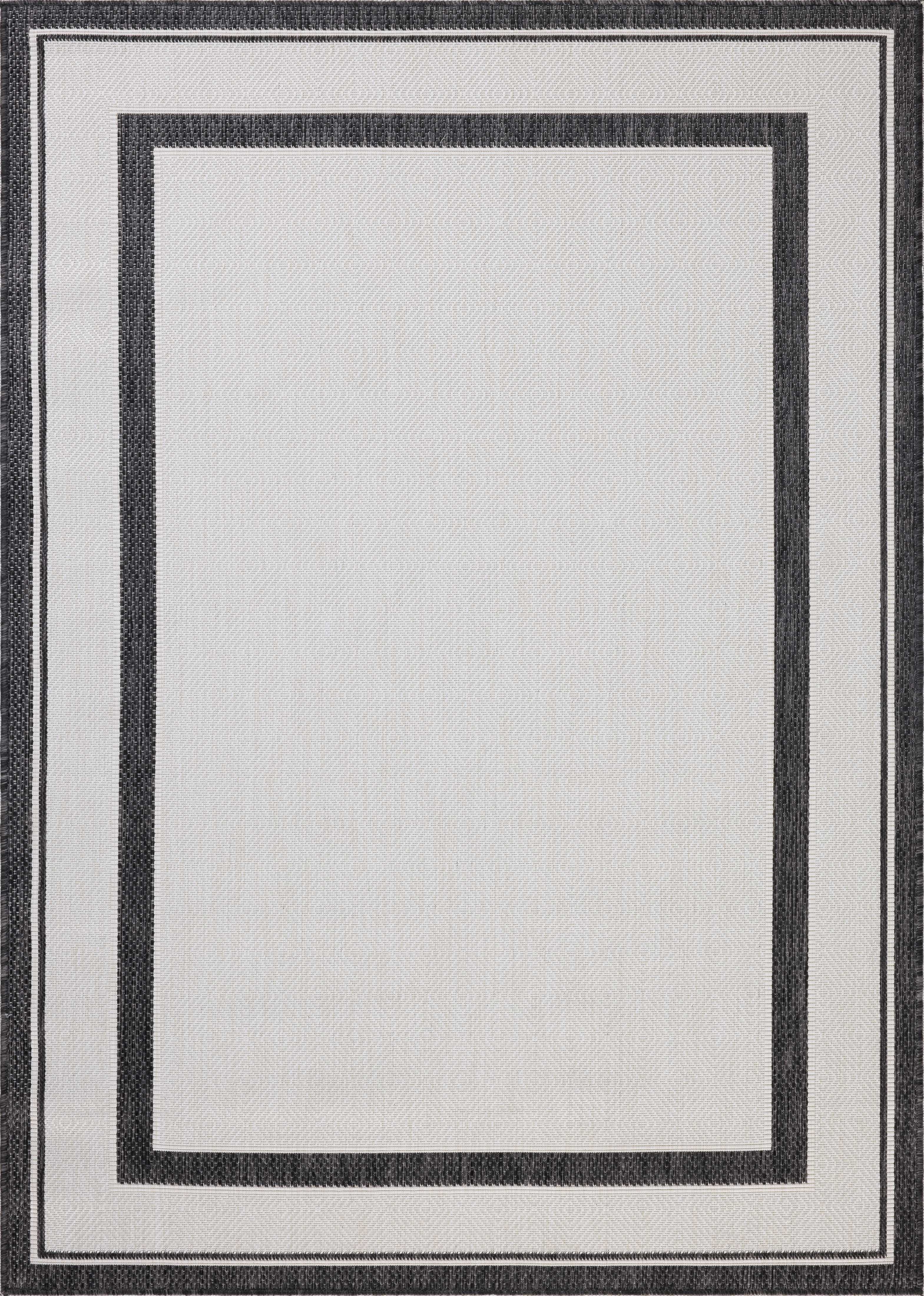 Finished in bold onyx and refined ivory tones, the Easton ESN-11 Onyx / Ivory Area Rug is a power-loomed polypropylene area rug for modern living