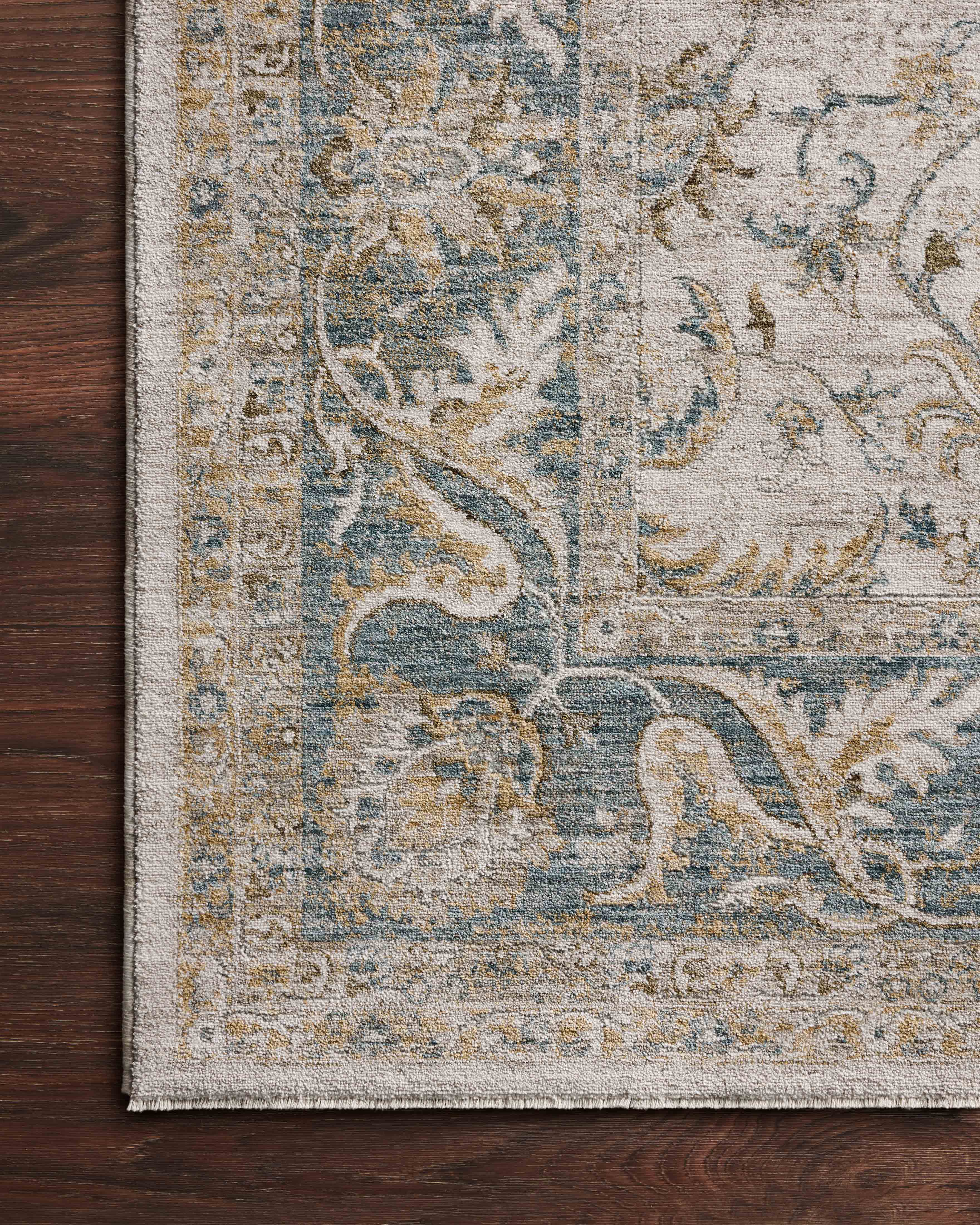 The Gaia GAA-04 Natural / Ocean Area Rug delivers warm natural and serene ocean beauty and traditional and abstract elegance in a power-loomed 100% polyester area rug