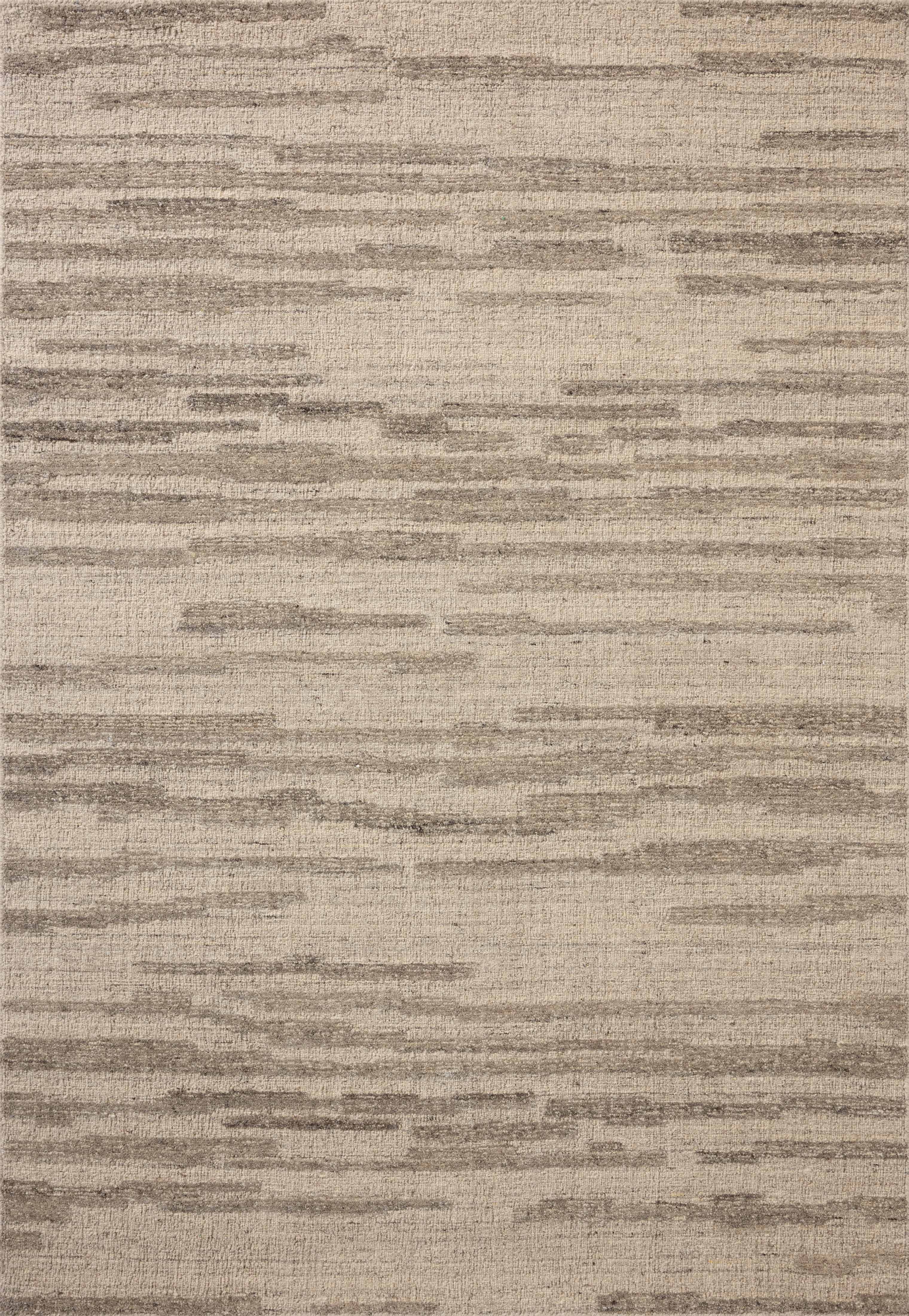 With shimmering silver and elegant grey hues and traditional styling, the Hartley HRT-02 Silver / Grey Area Rug is a hand-tufted wool area rug that elevates any room
