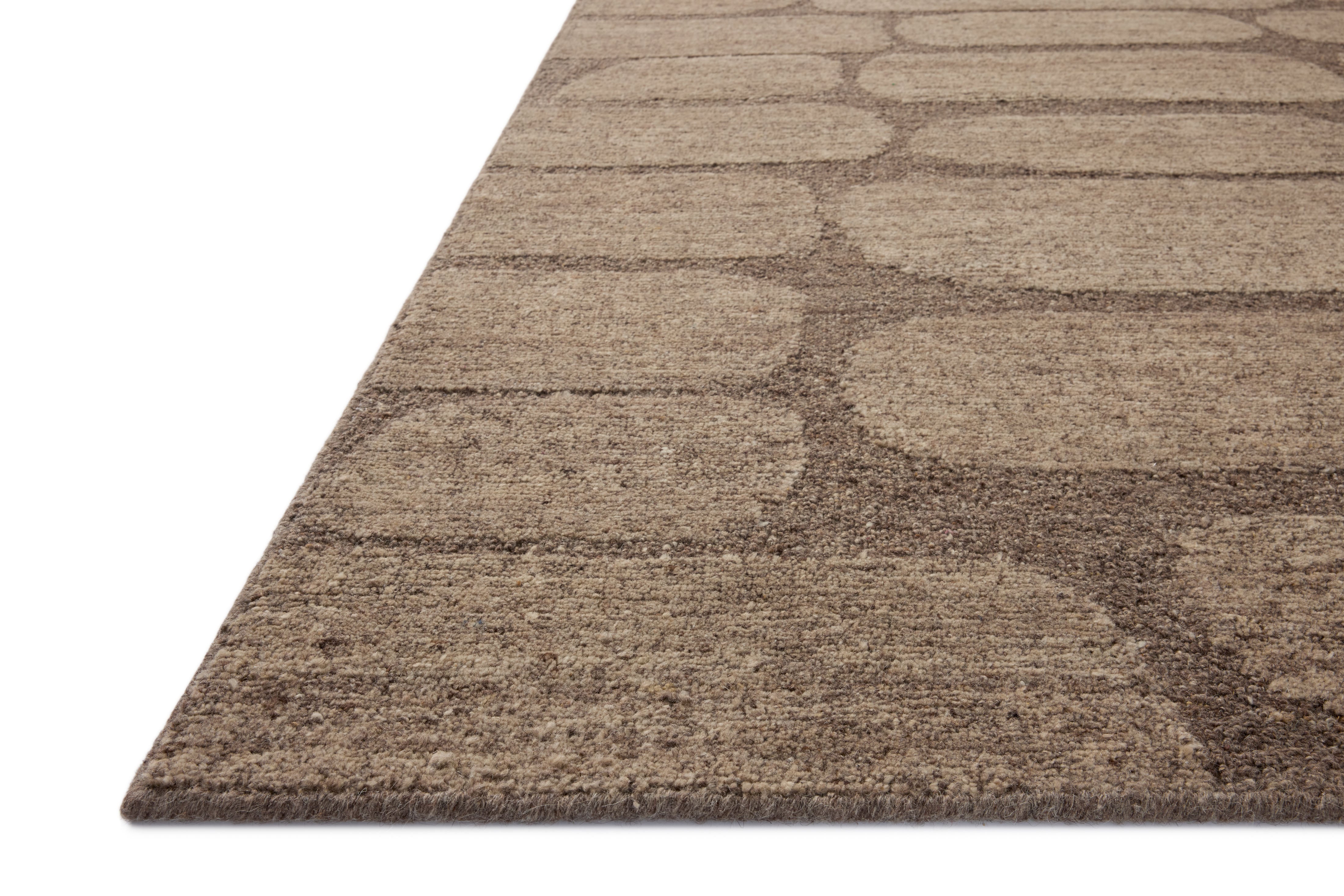 The Hartley HRT-05 Brown / Taupe Area Rug delivers brown and versatile taupe beauty and traditional elegance in a hand-tufted wool area rug