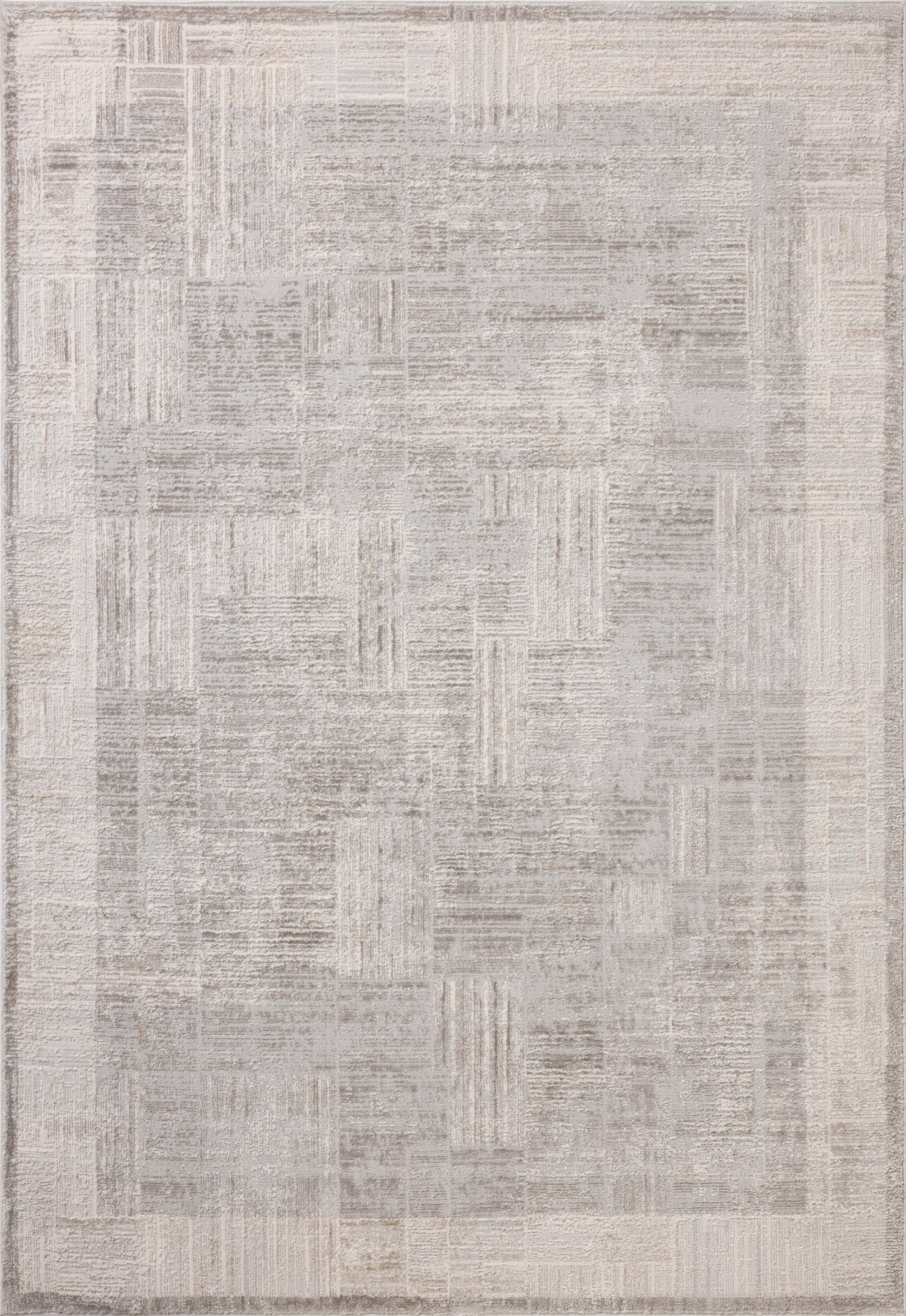 The Hollis HOL-04 Smoke / Mist Area Rug transforms any space with smoky and soft misty tones and geometric design in a power-loomed polyester area rug