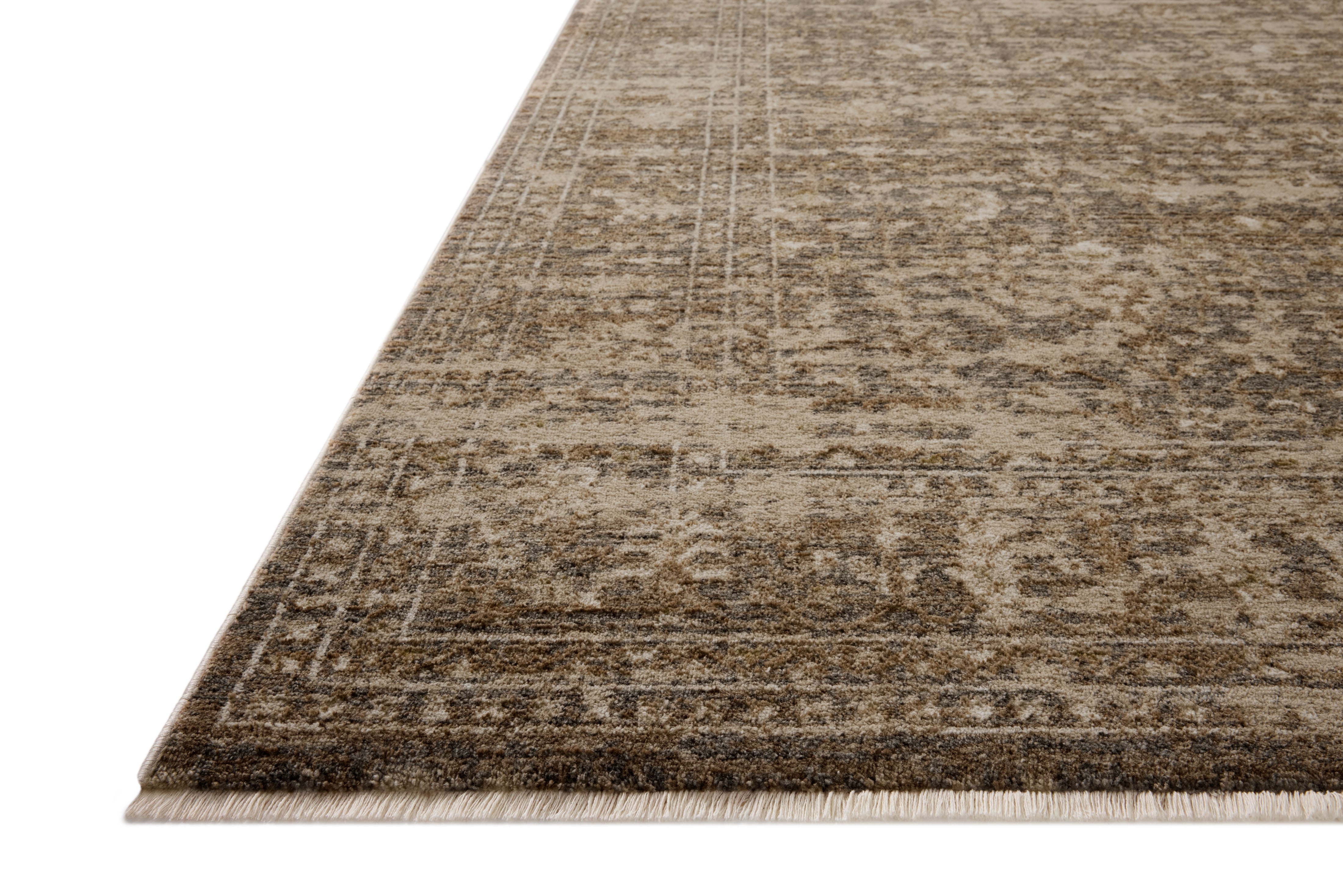 Designed with traditional and distressed artistry in striking granite and warm natural hues, the Haywood HYD-01 Granite / Natural Area Rug is a power-loomed polyester area rug that stands out