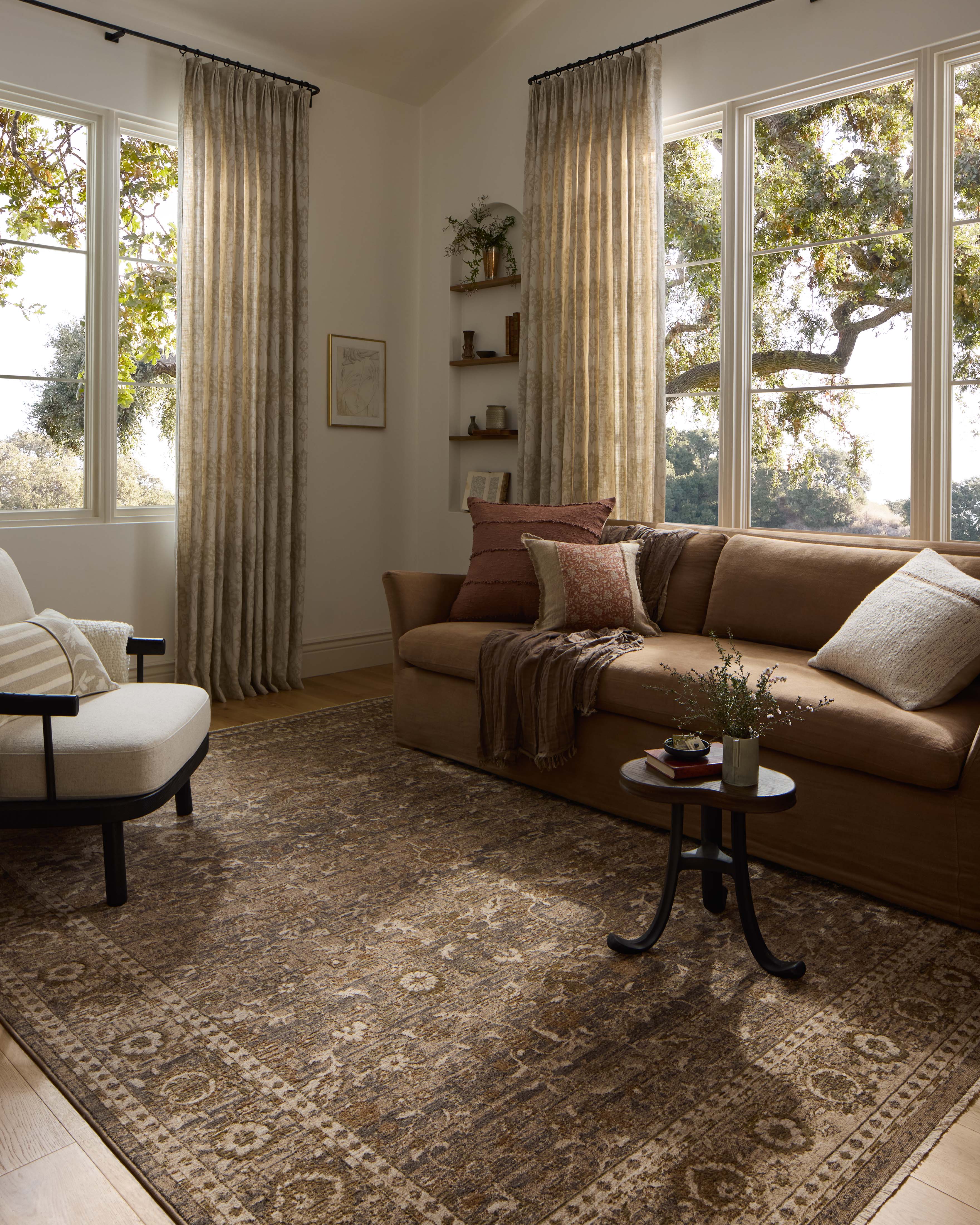 Rich in subtle pebble and deep charcoal hues with traditional and distressed detail, the Haywood HYD-02 Pebble / Charcoal Area Rug is a power-loomed polyester area rug built for style and comfort