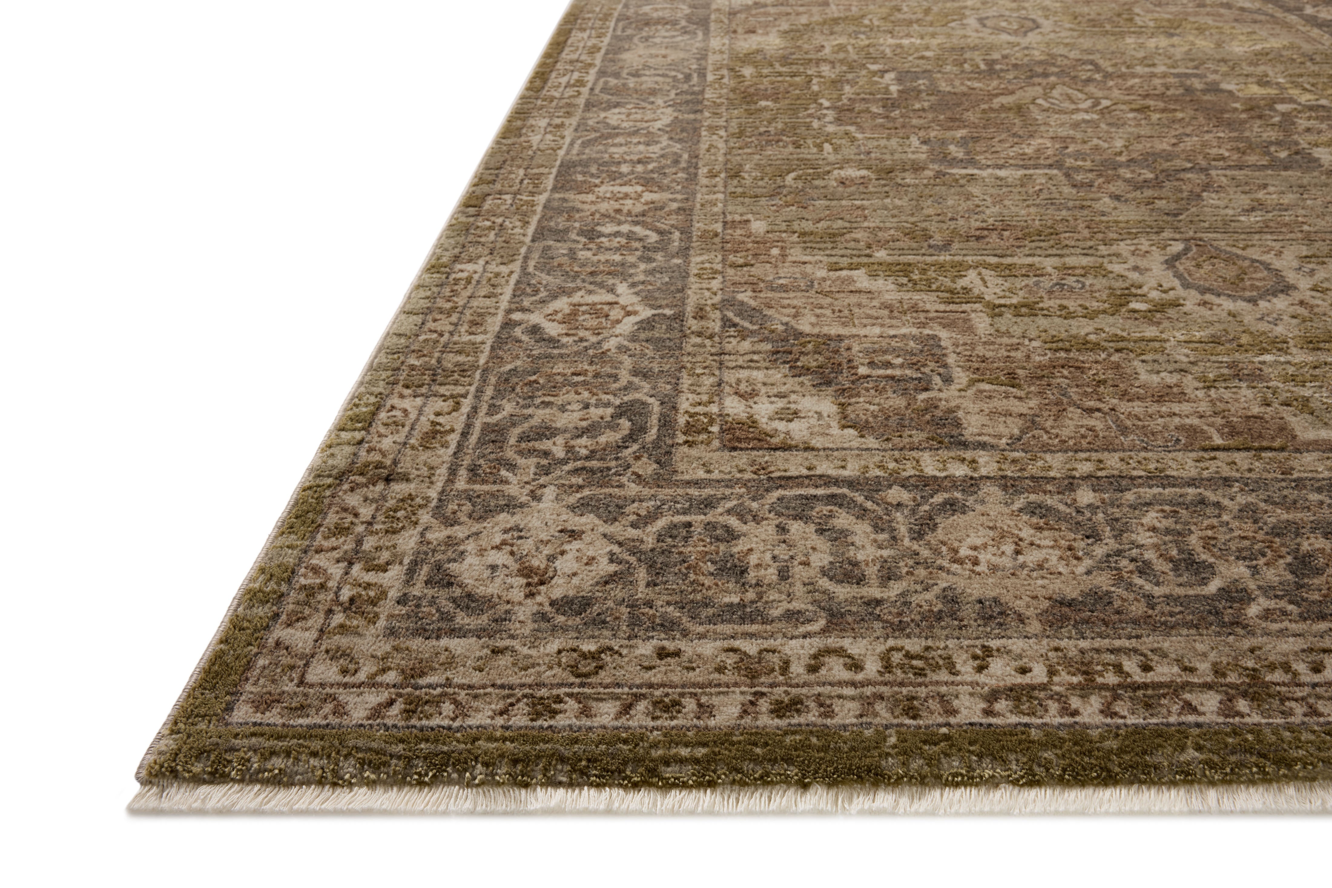 The Haywood HYD-03 Moss / Charcoal Area Rug brings lush moss and deep charcoal character and traditional and distressed flair to your home in a power-loomed polyester area rug