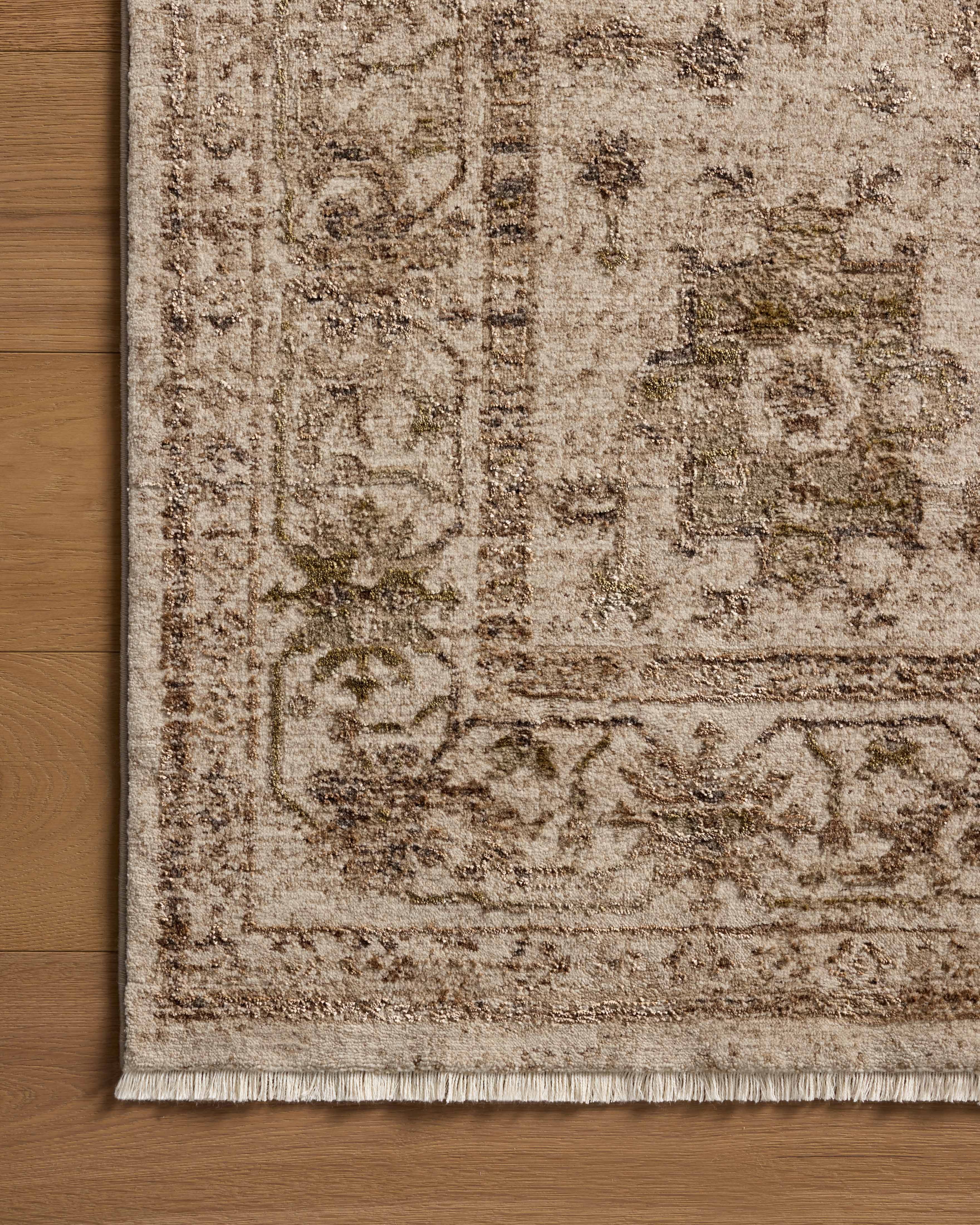 A power-loomed polyester area rug with traditional and distressed design in refined ivory and versatile taupe hues, the Haywood HYD-04 Ivory / Taupe Area Rug is a standout in any décor