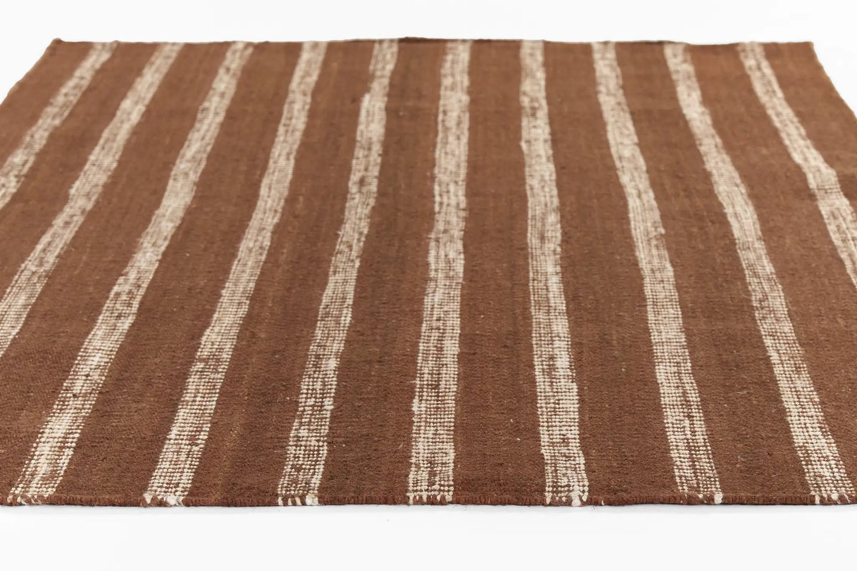Jango JAN-1 Rust Area Rug by Momeni