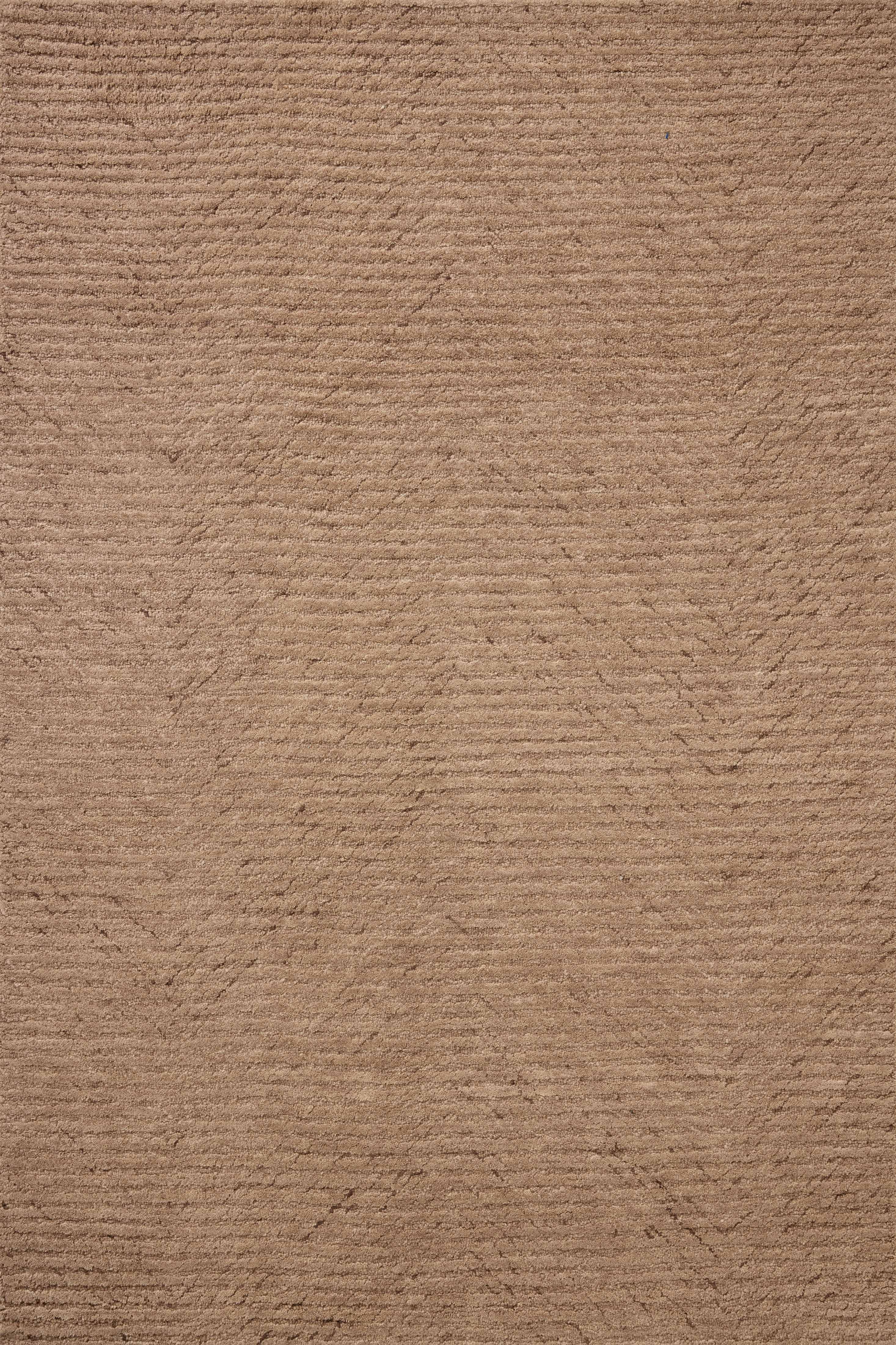 Finished in delicate blush tones with ribbed styling, the Kai KAI-01 Blush Area Rug is a hand-tufted wool area rug for modern living