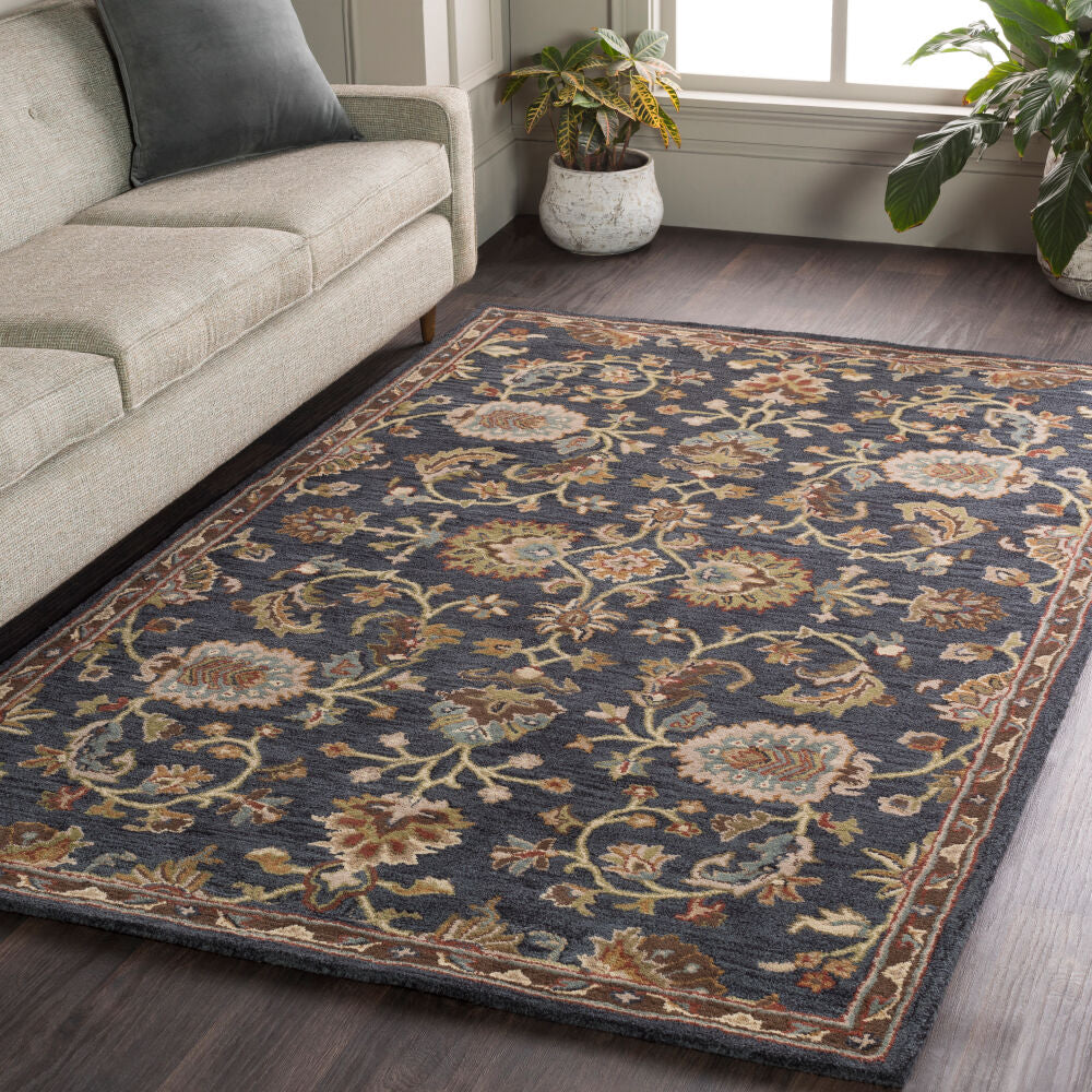 Traditional area rug with an elegant floral pattern featuring Ink Blue, Olive, Taupe, Dark Brown, and burgundy tones, adding timeless charm and classic style to any room.
