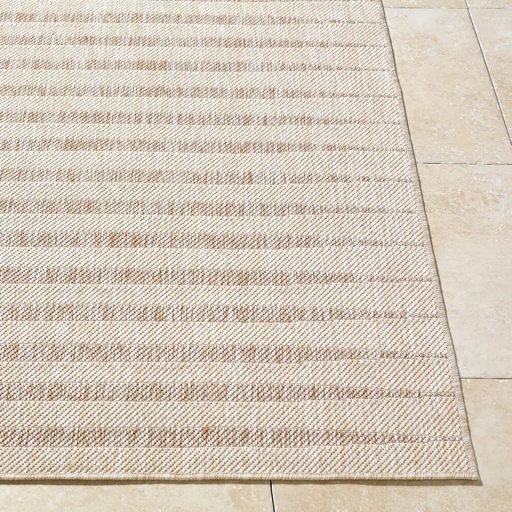 Close-up of the Agave GAAG-2301 Off-White Area Rug with a textured, striped pattern on a tile floor.