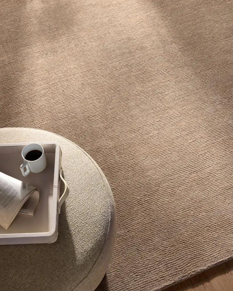 Livabliss Mystique M-335 Tan wool area rug with textured high-low pile anchors modern interior.