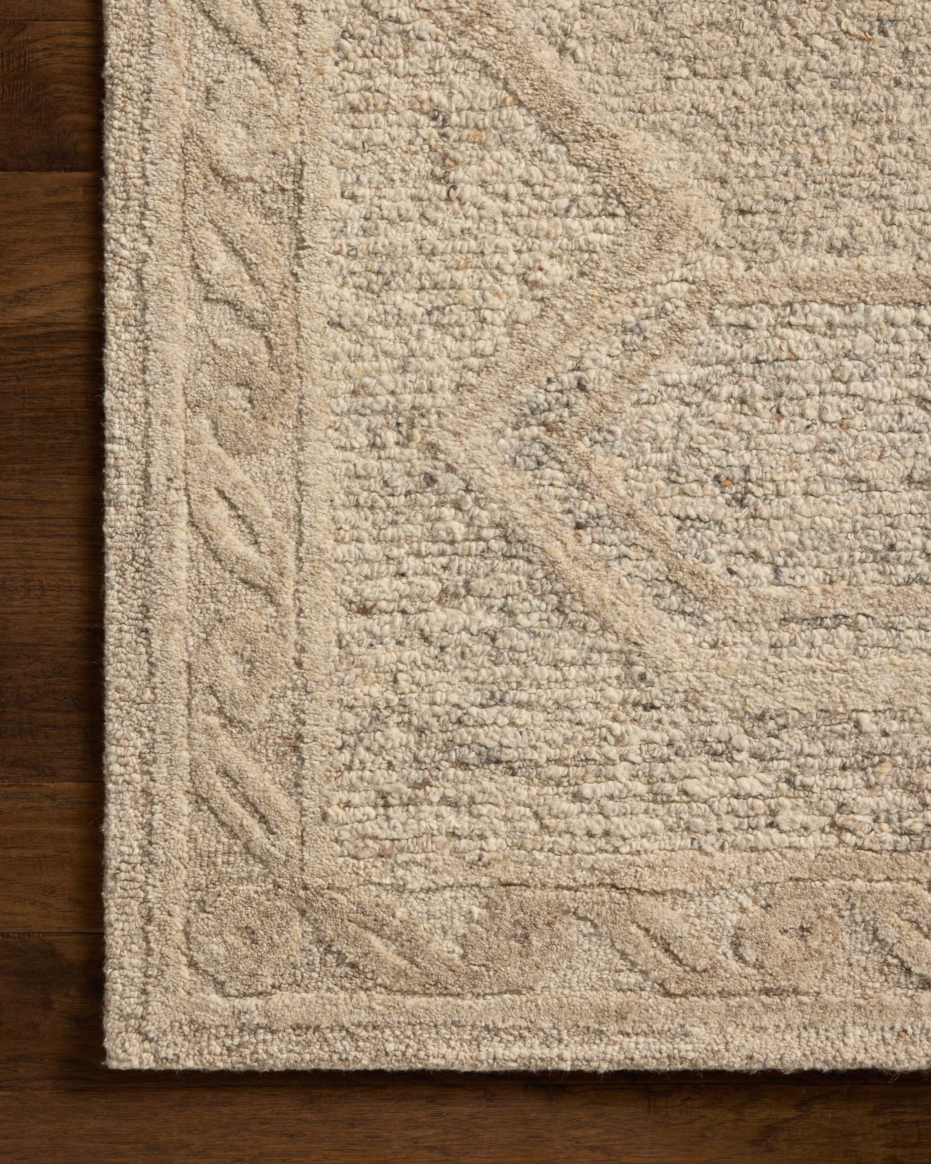 The Mabel MBL-01 Stone / Sand Area Rug offers grounding stone and sandy sophistication and traditional charm in a hand-tufted wool area rug