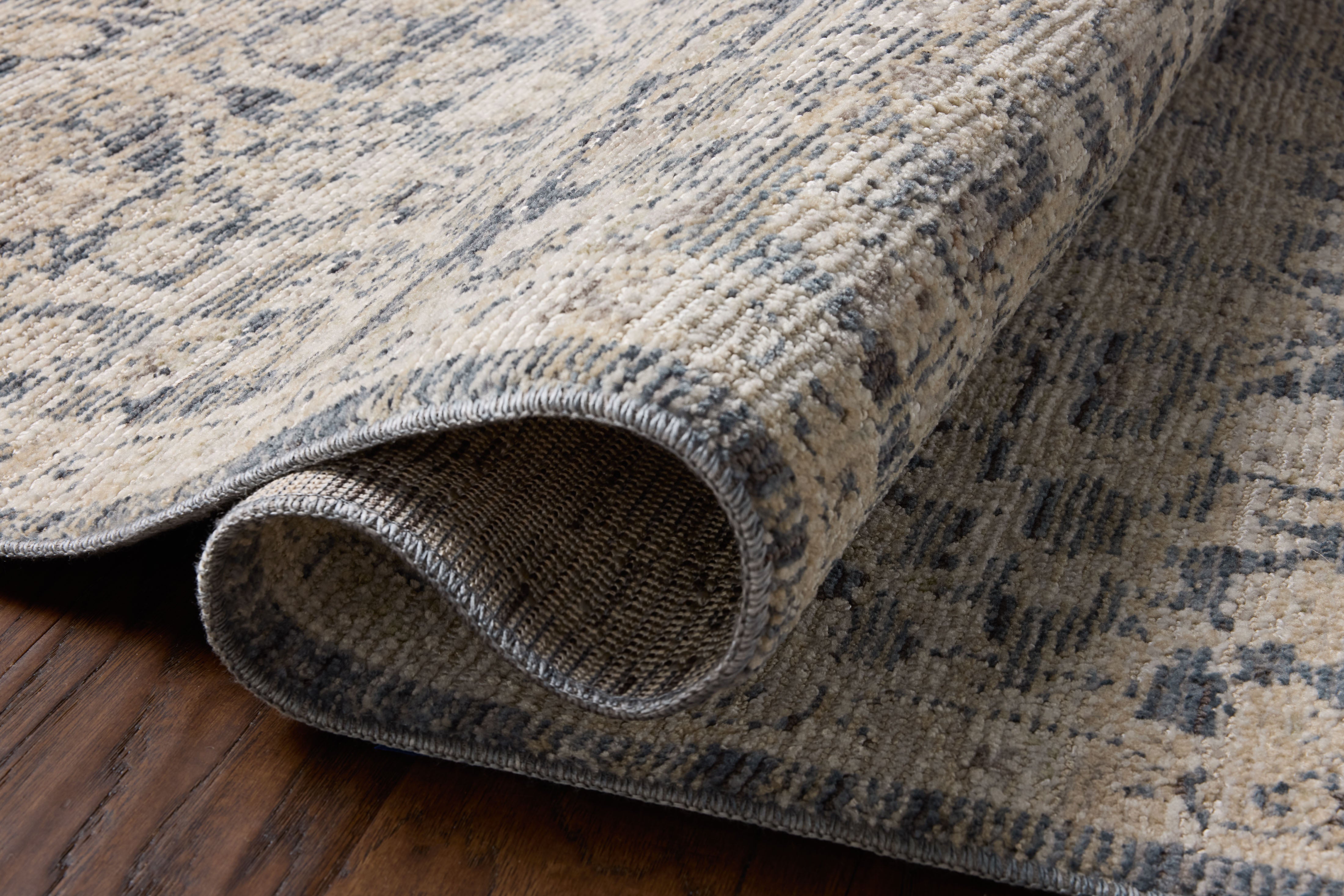 Loloi Milena MLE?02 denim blue and natural vintage area rug with classic motifs and neutral color palette