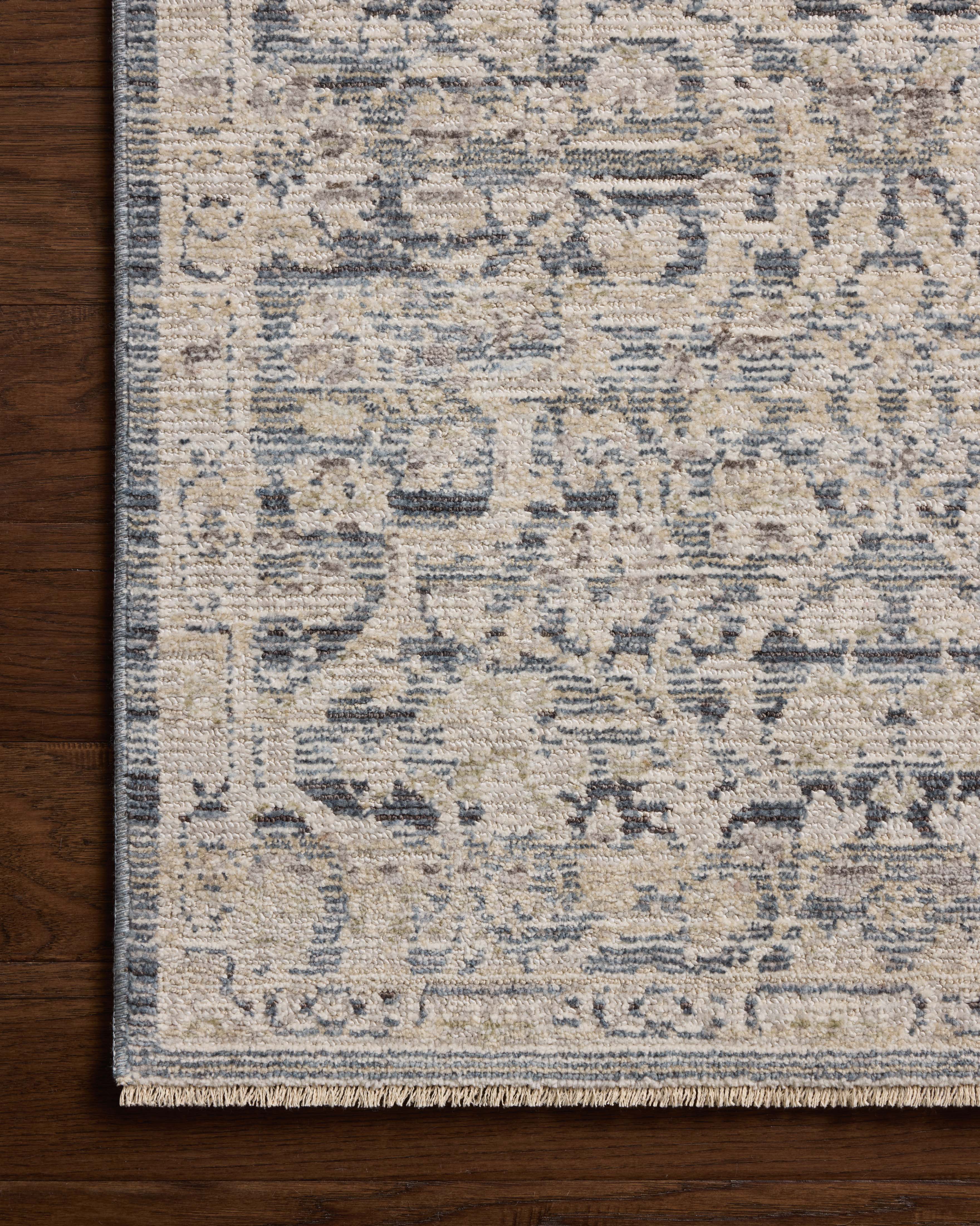 Loloi Milena MLE?02 denim blue and natural vintage area rug with classic motifs and neutral color palette