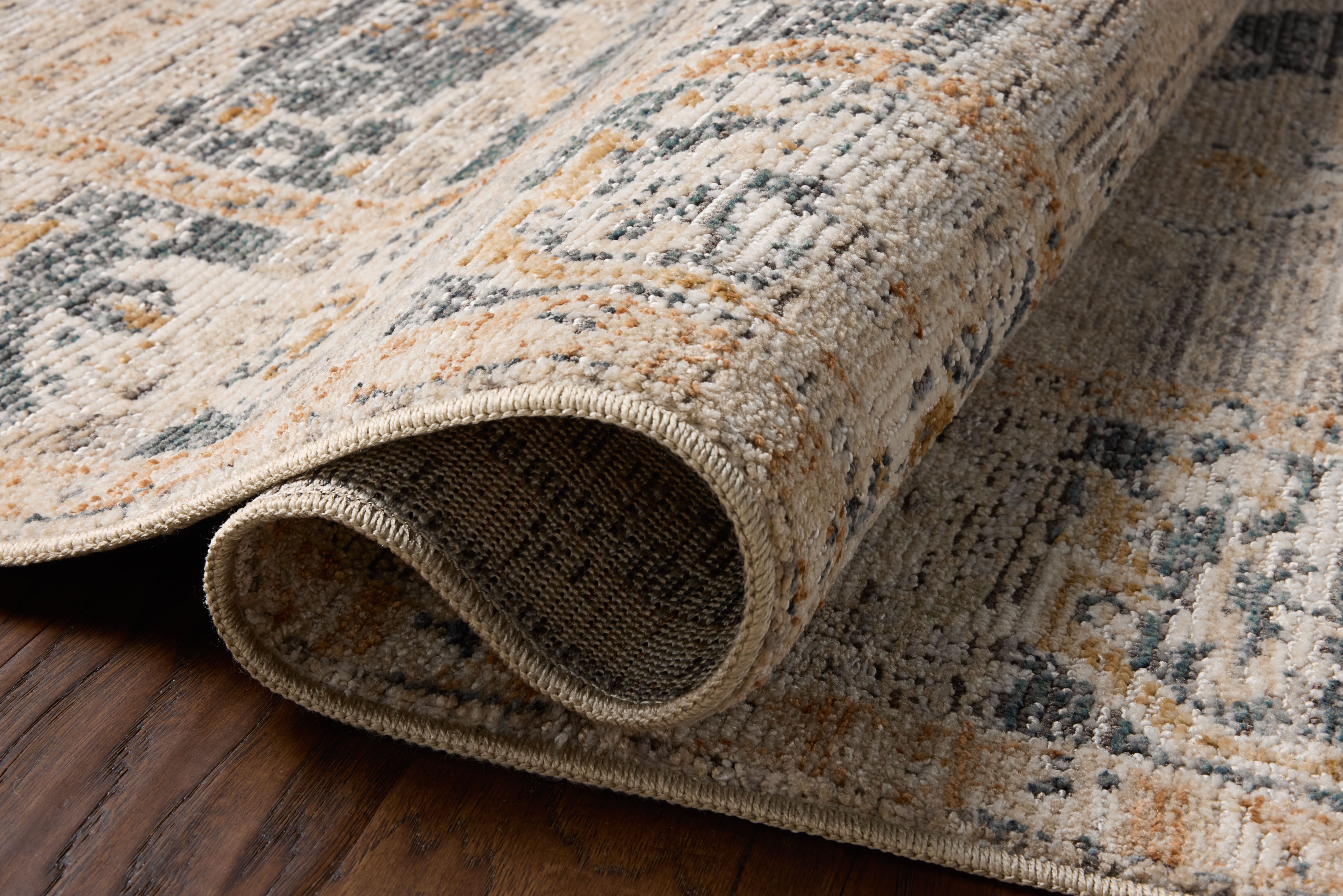 Loloi Milena MLE?04 natural and ivory vintage area rug featuring neutral tones and traditional pattern