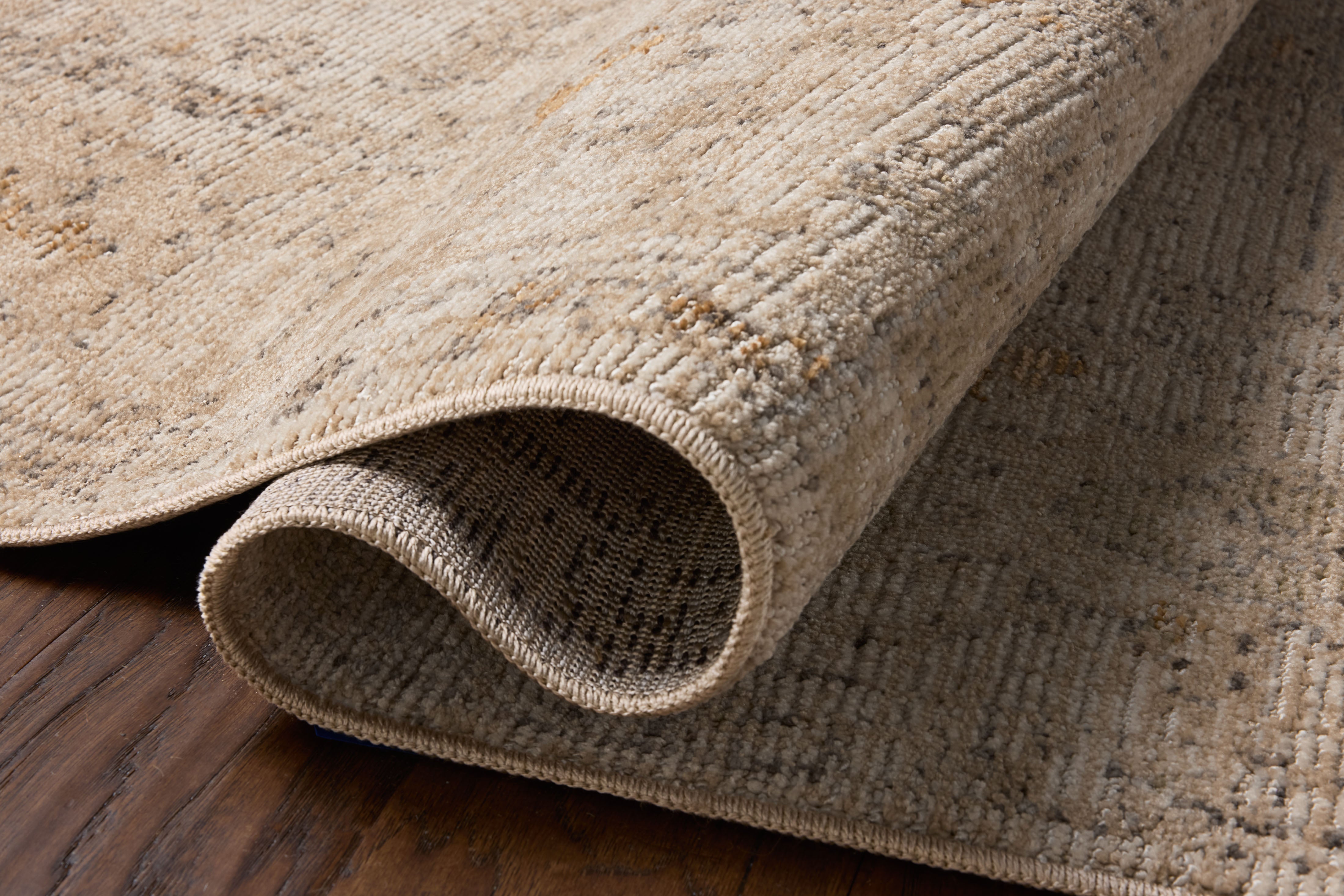 Loloi Milena MLE?08 ivory and sand vintage?inspired area rug with soft neutral tones and textured pattern