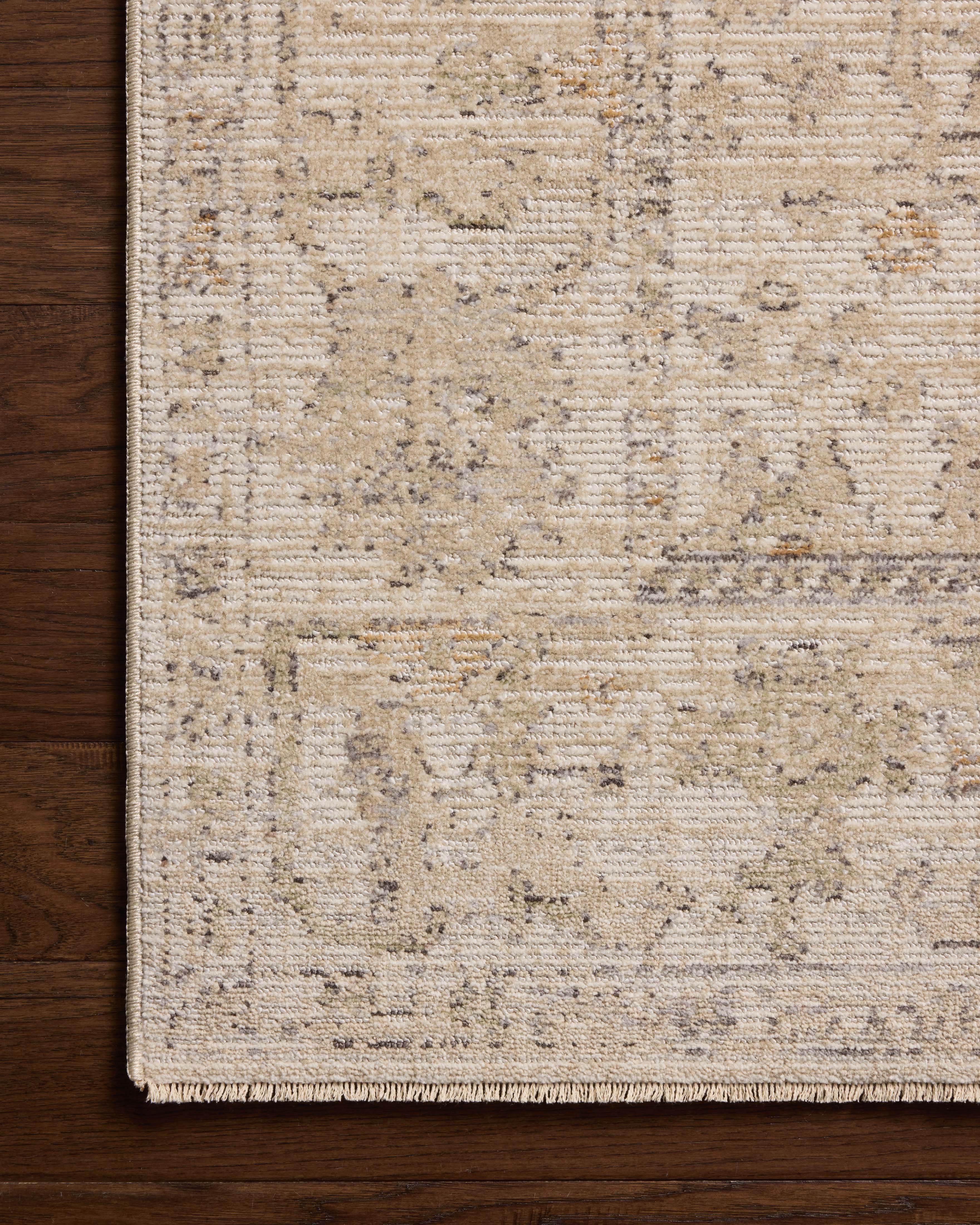 Loloi Milena MLE?08 ivory and sand vintage?inspired area rug with soft neutral tones and textured pattern