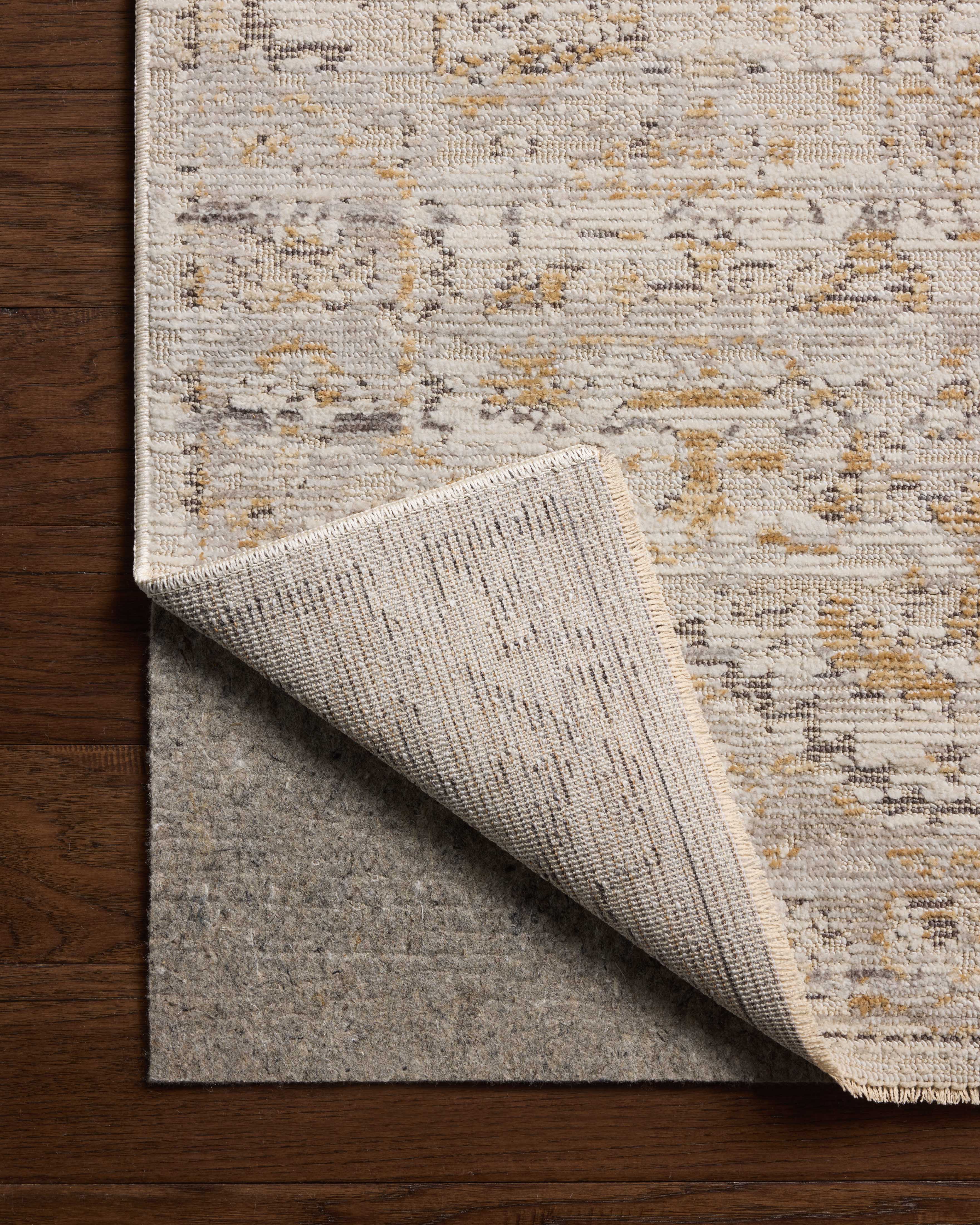 Loloi Milena MLE?09 ivory and ochre vintage area rug with warm accents and classic decorative pattern