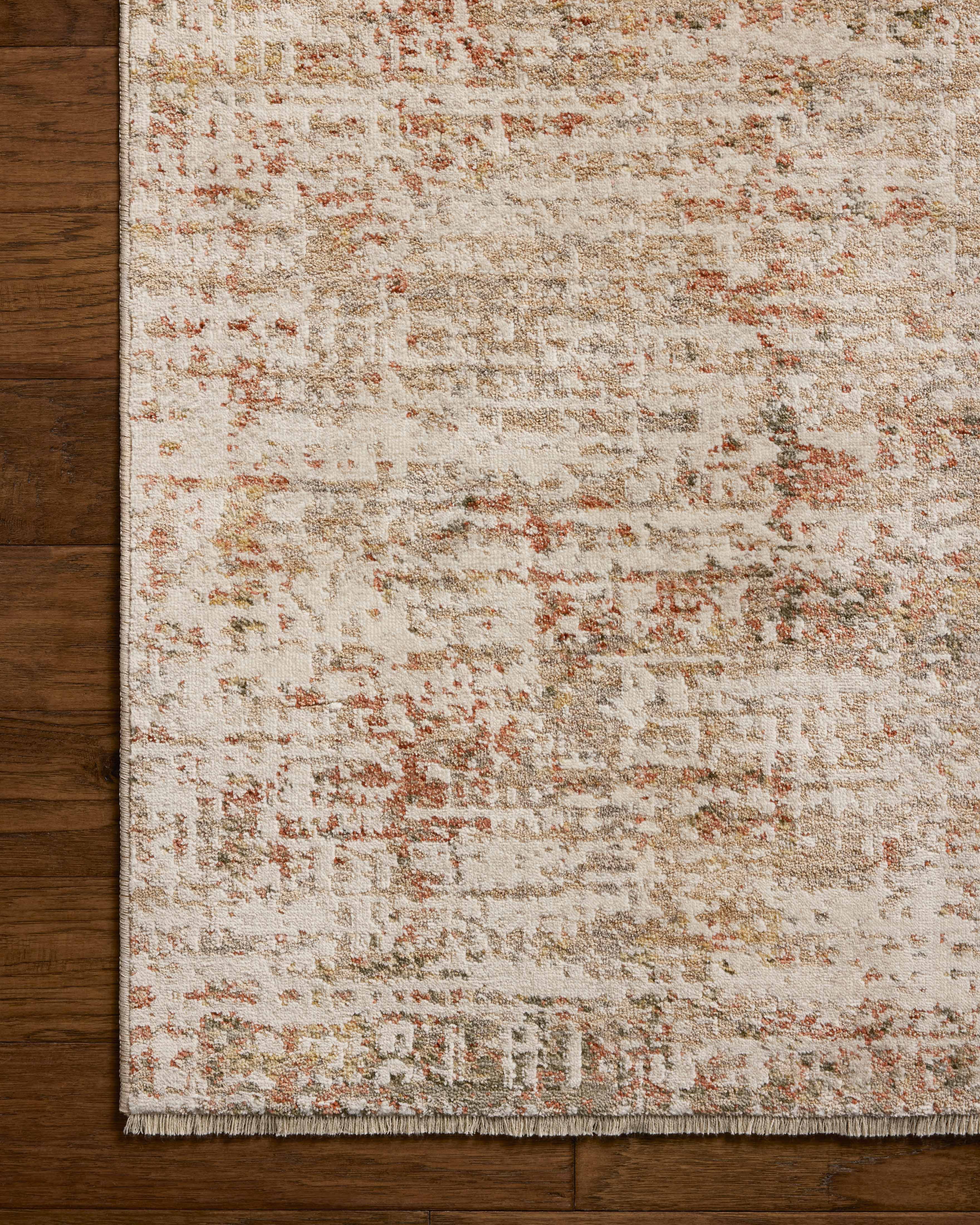 A power-loomed polyester and polypropylene area rug with graphic flair in warm natural and glowing sunset tones, the Nellie NEL-02 Natural / Sunset Area Rug anchors any room