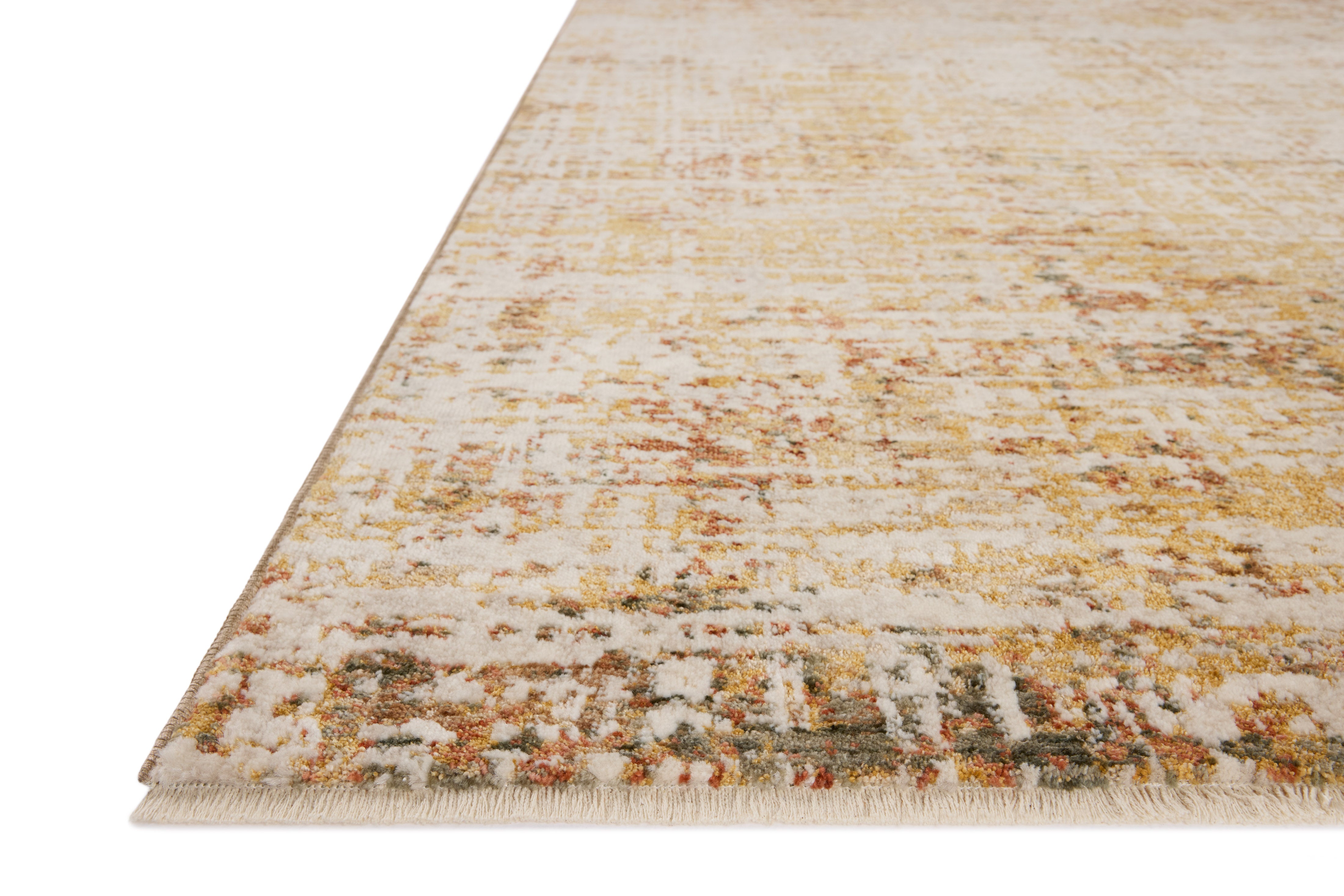 The Nellie NEL-02 Sunset / Pebble Area Rug pairs glowing sunset and subtle pebble tones and graphic patterns in a power-loomed polyester and polypropylene area rug