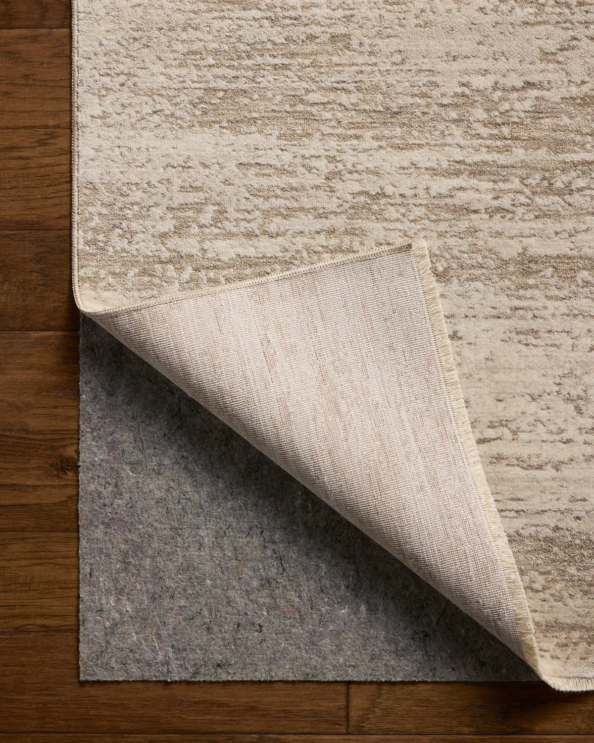 Nellie NEL-04 Ivory / Pebble Area Rug by Loloi