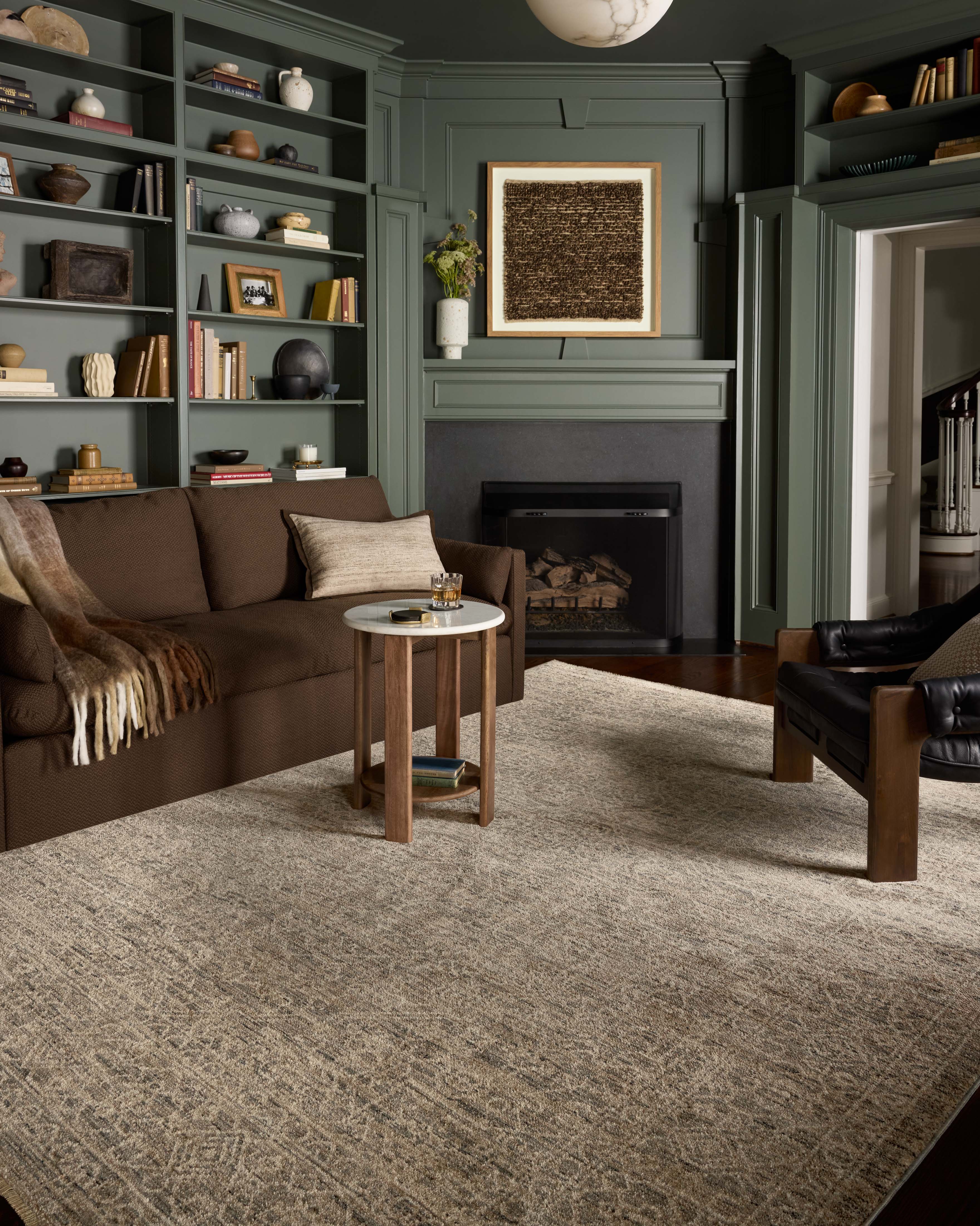 Dressed in cool slate and warm natural hues with vintage and distressed detail, the Newman NEW-01 Slate / Natural Area Rug is a power-loomed polyester area rug that completes any room