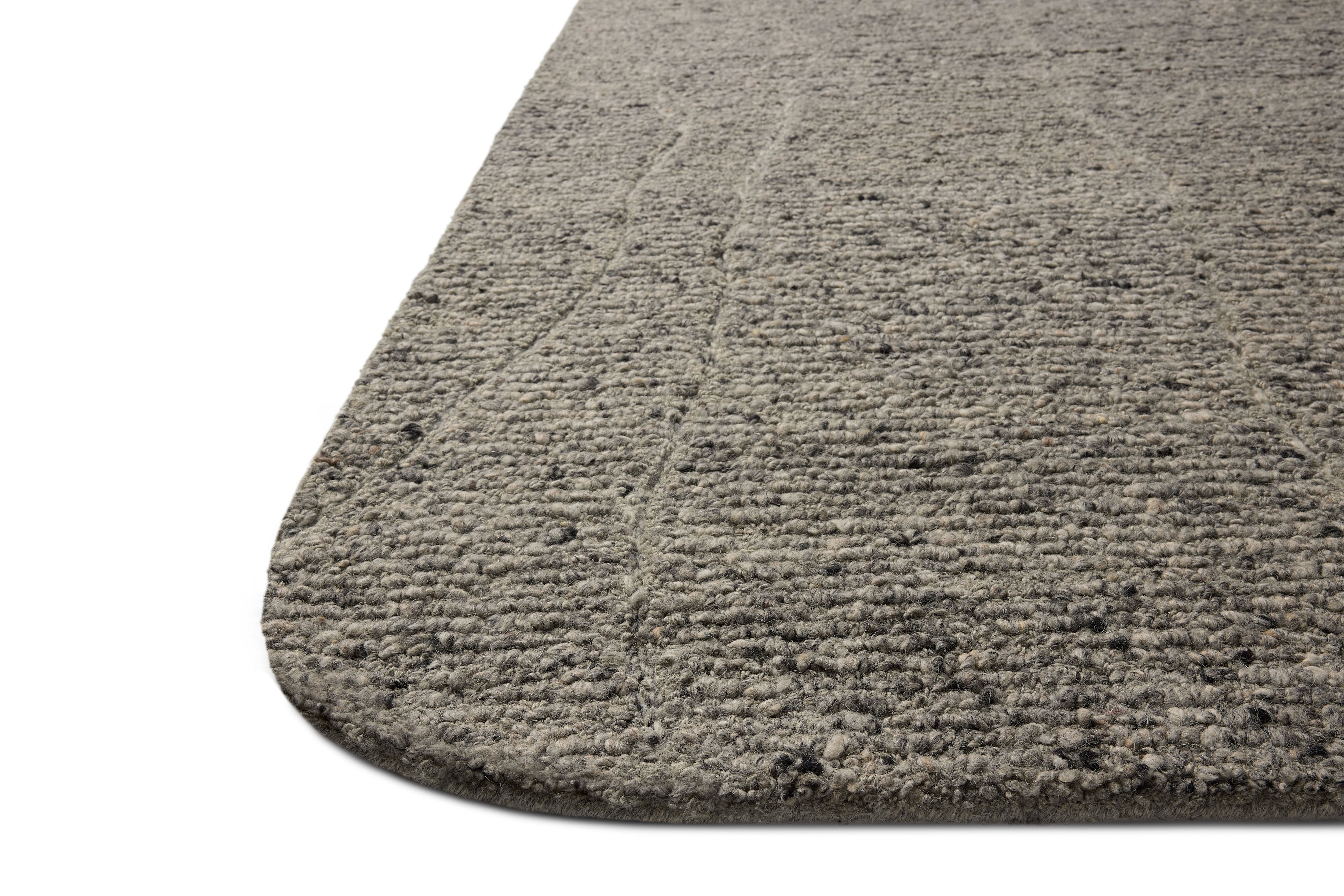 With soft misty and elegant grey hues and linear styling, the Otis OTT-03 Mist / Grey Area Rug is a hand-tufted wool area rug that elevates any room
