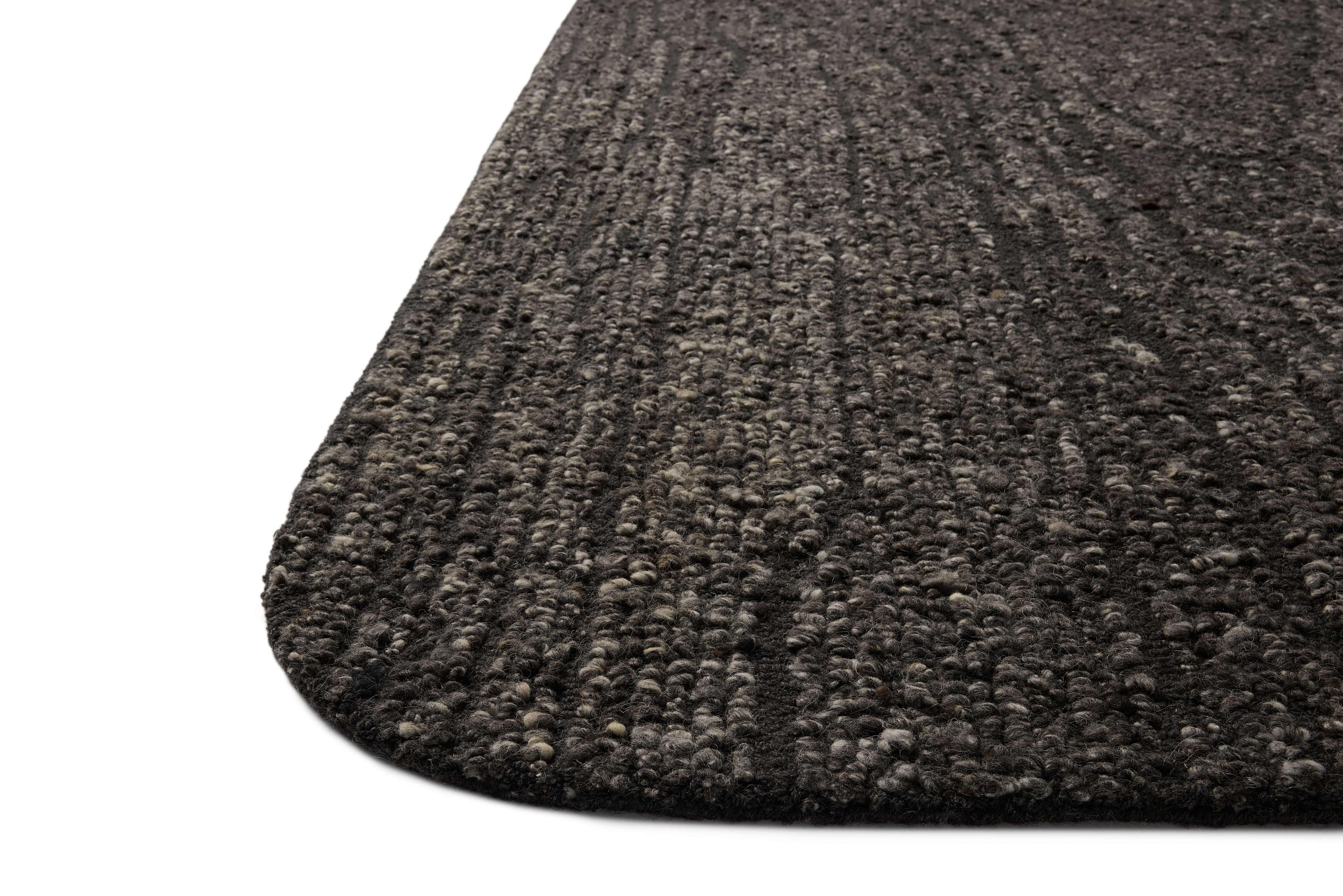 A stunning hand-tufted wool area rug with linear detail, the Otis OTT-05 Charcoal / Granite Area Rug features deep charcoal and striking granite tones for a polished look