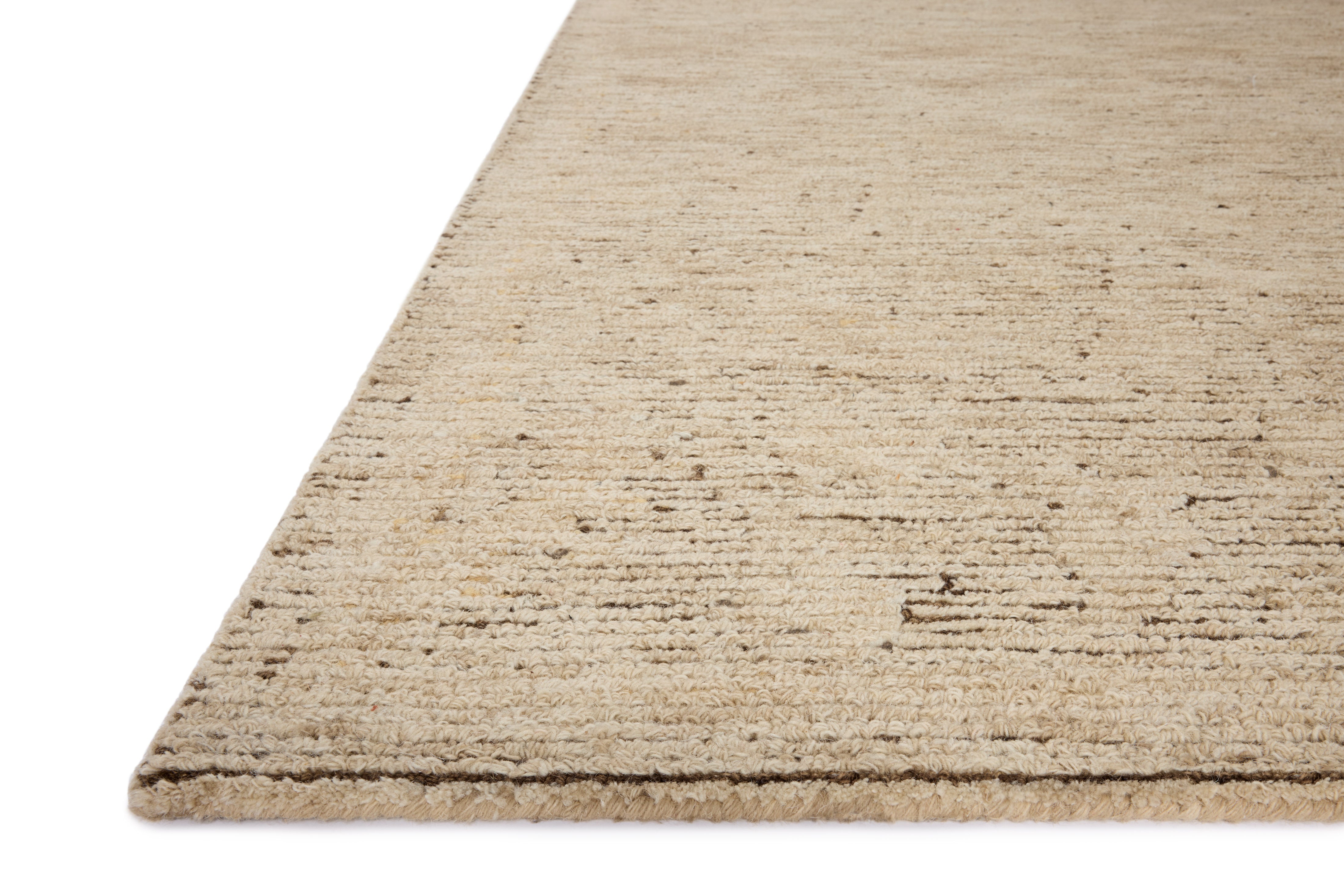 Layered in coffee and warm natural hues with ribbed and high-low textured patterns, the Penny PEN-02 Coffee / Natural Area Rug is a hand-tufted wool area rug perfect for any setting
