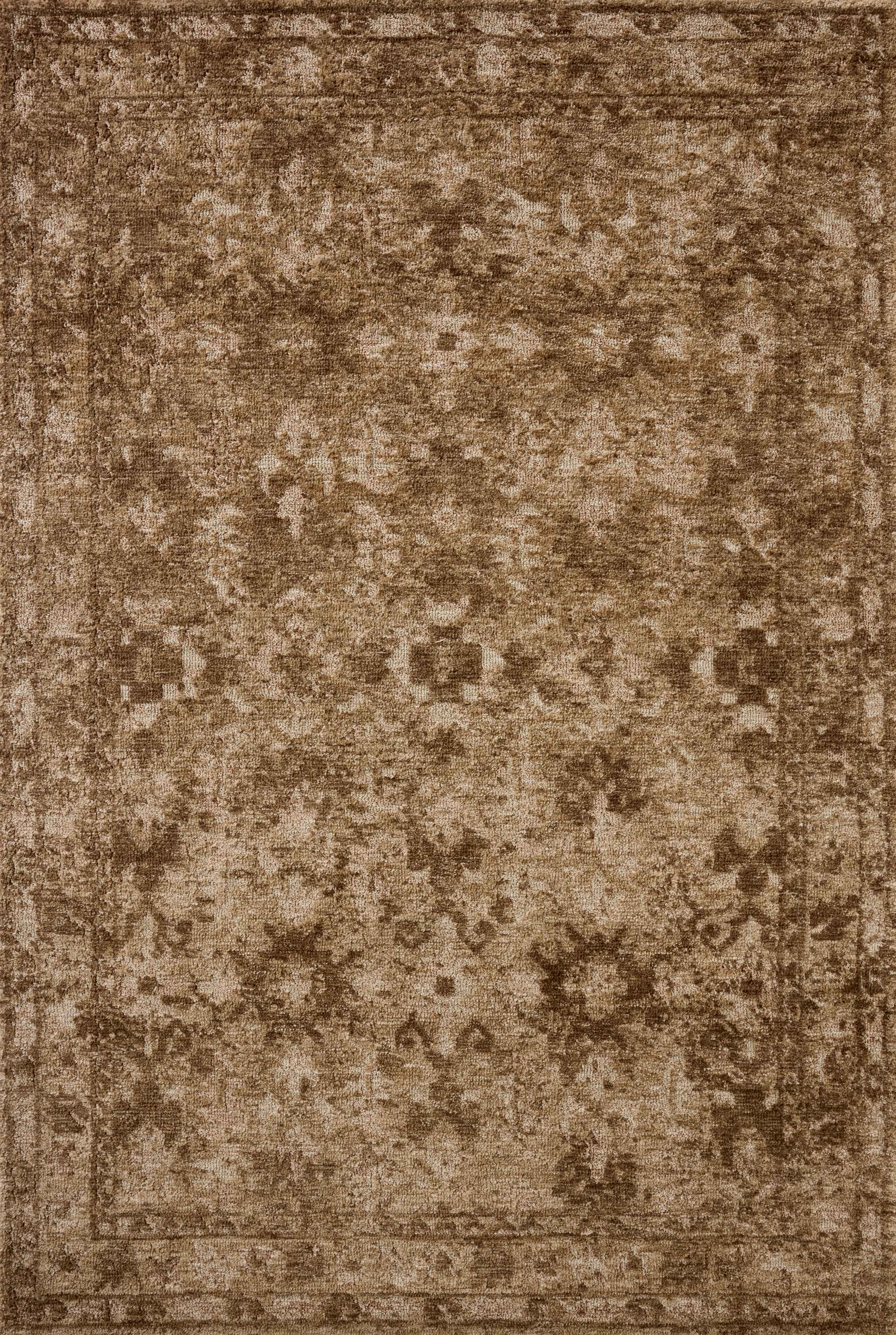 The Percival PCV-03 Mocha / Sand Area Rug transforms any space with luxurious mocha and sandy tones and traditional design in a power-loomed polyester area rug