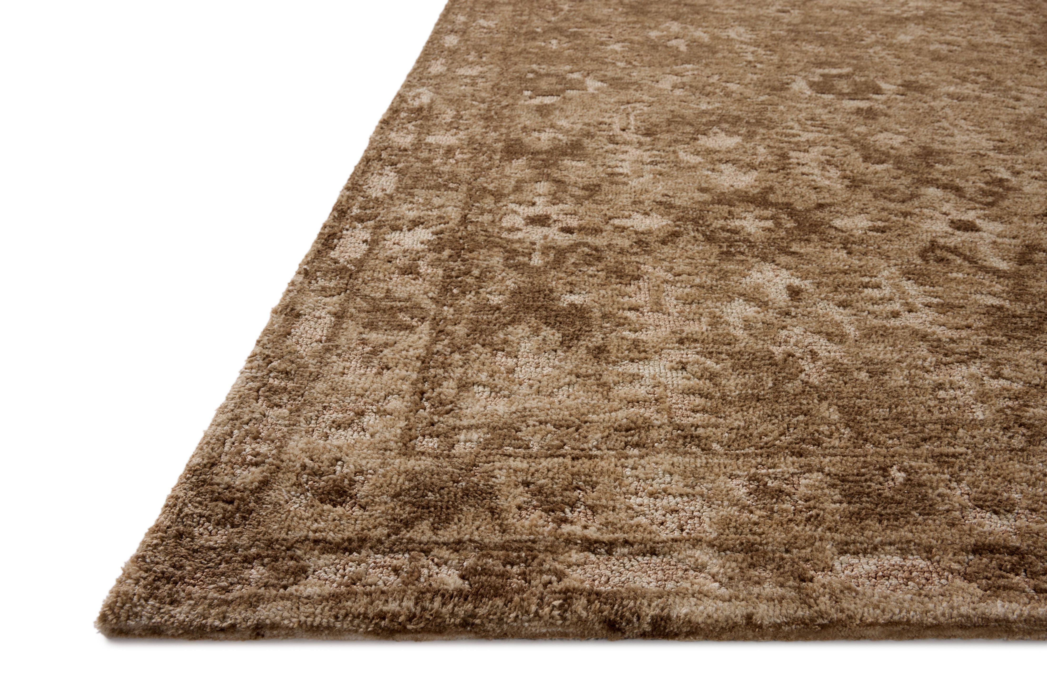 The Percival PCV-03 Mocha / Sand Area Rug transforms any space with luxurious mocha and sandy tones and traditional design in a power-loomed polyester area rug