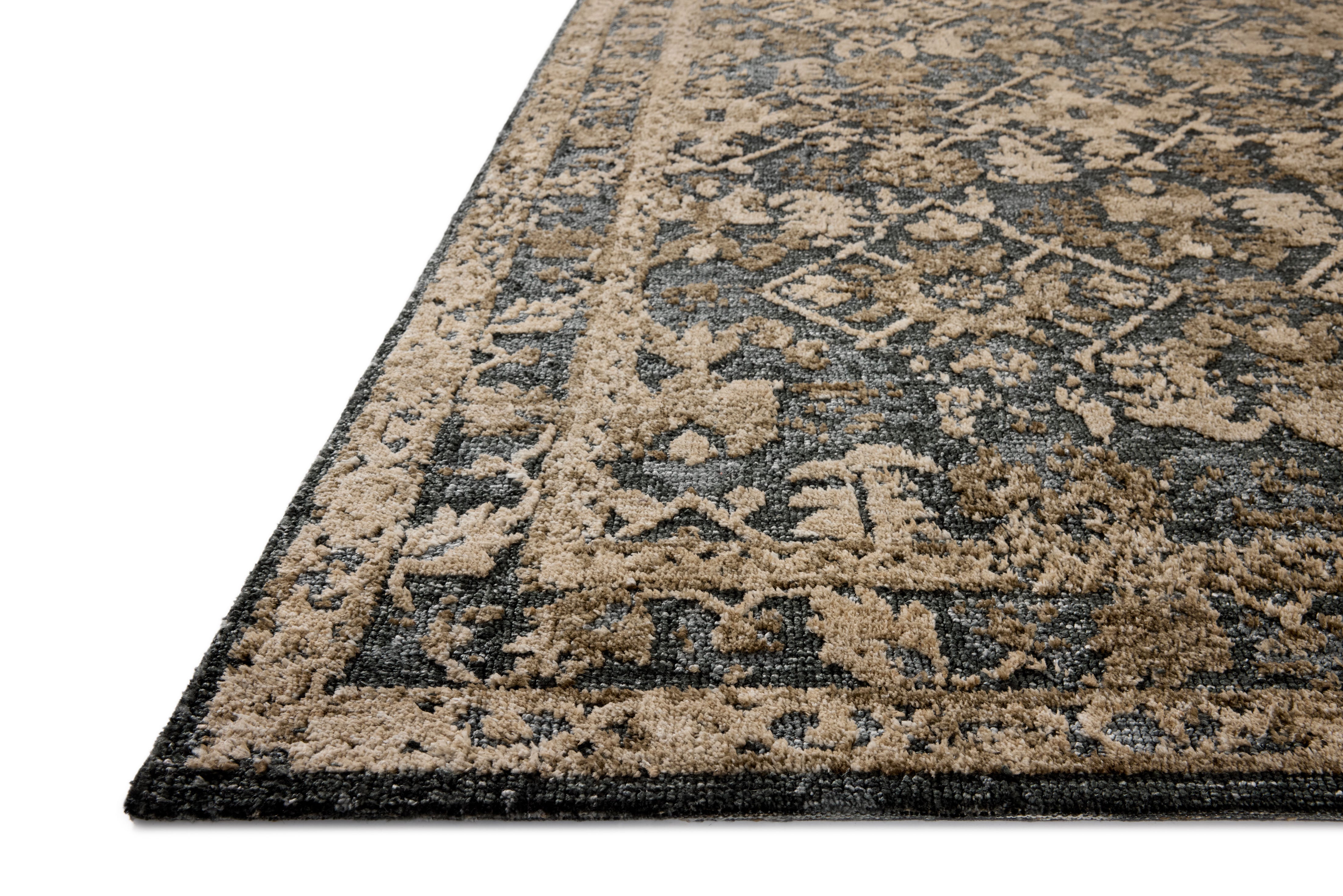 The Percival PCV-05 Denim /Granite Area Rug is a power-loomed polyester area rug that radiates casual denim and striking granite charm and traditional elegance