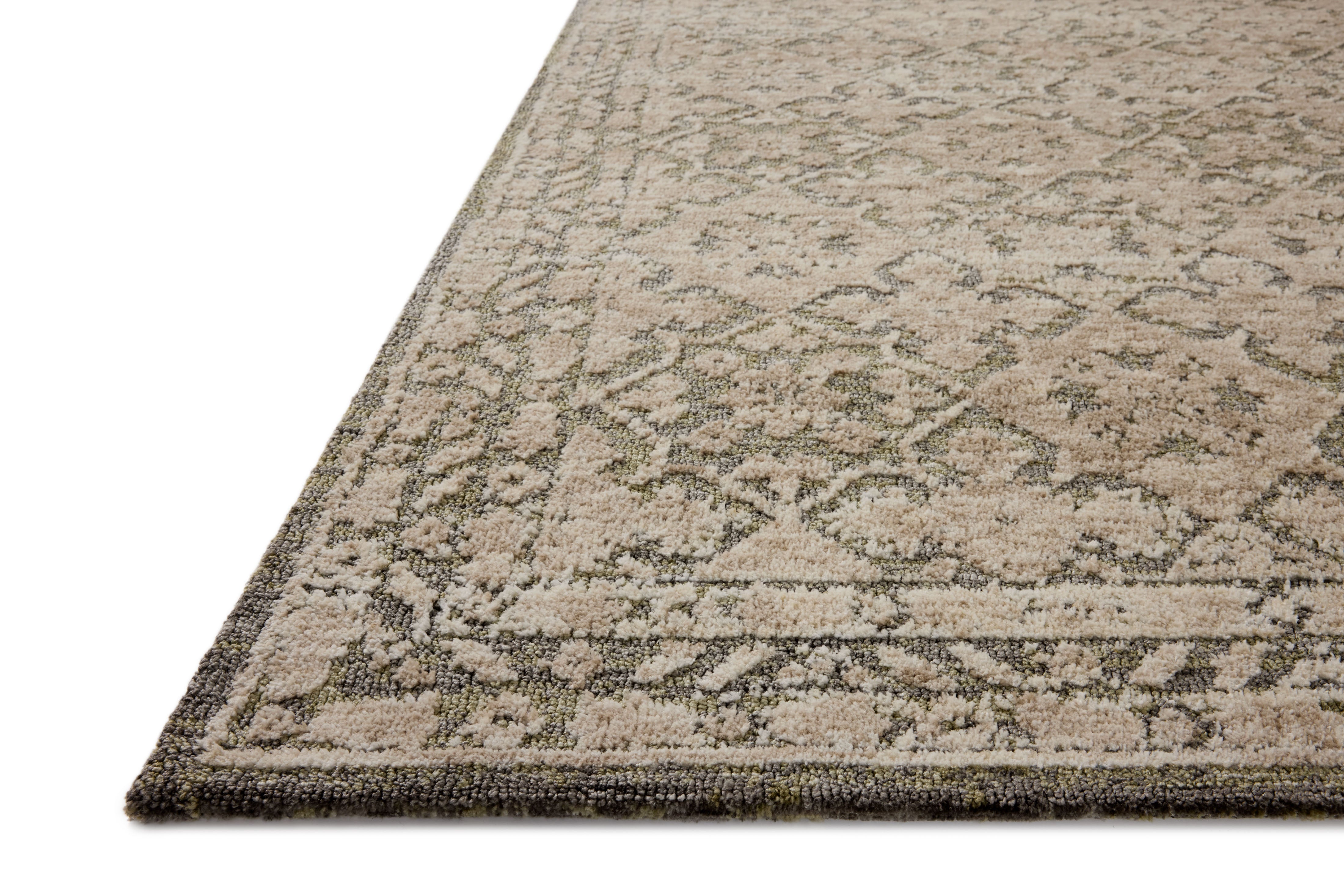 Finished in calming sage and grounding stone tones with traditional styling, the Percival PCV-07 Sage / Stone Area Rug is a power-loomed polyester area rug for modern living