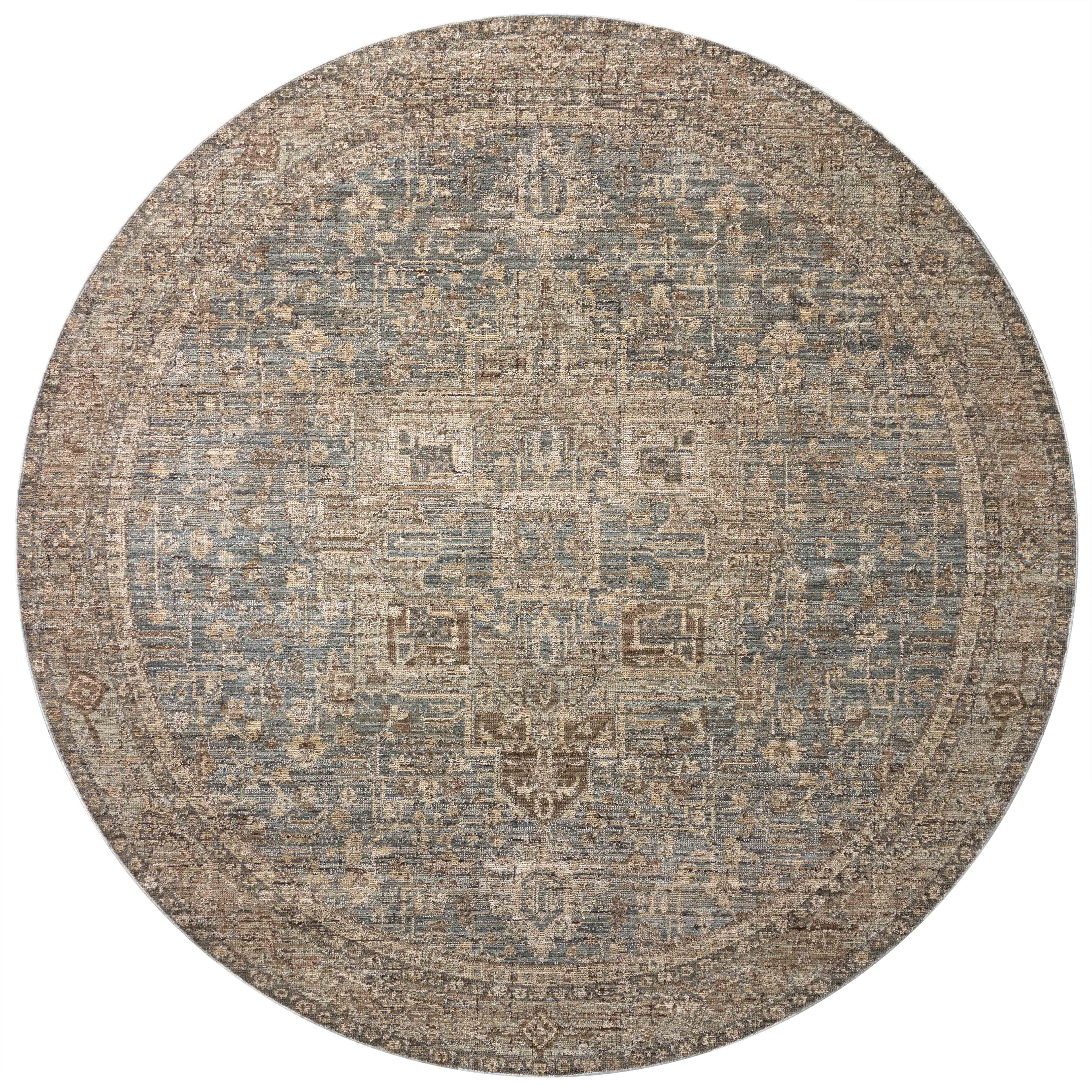 A power-loomed 100% polyester area rug with vintage flair in calming blue and grounded bark tones, the Priscilla PRL-04 Blue / Bark Area Rug anchors any room