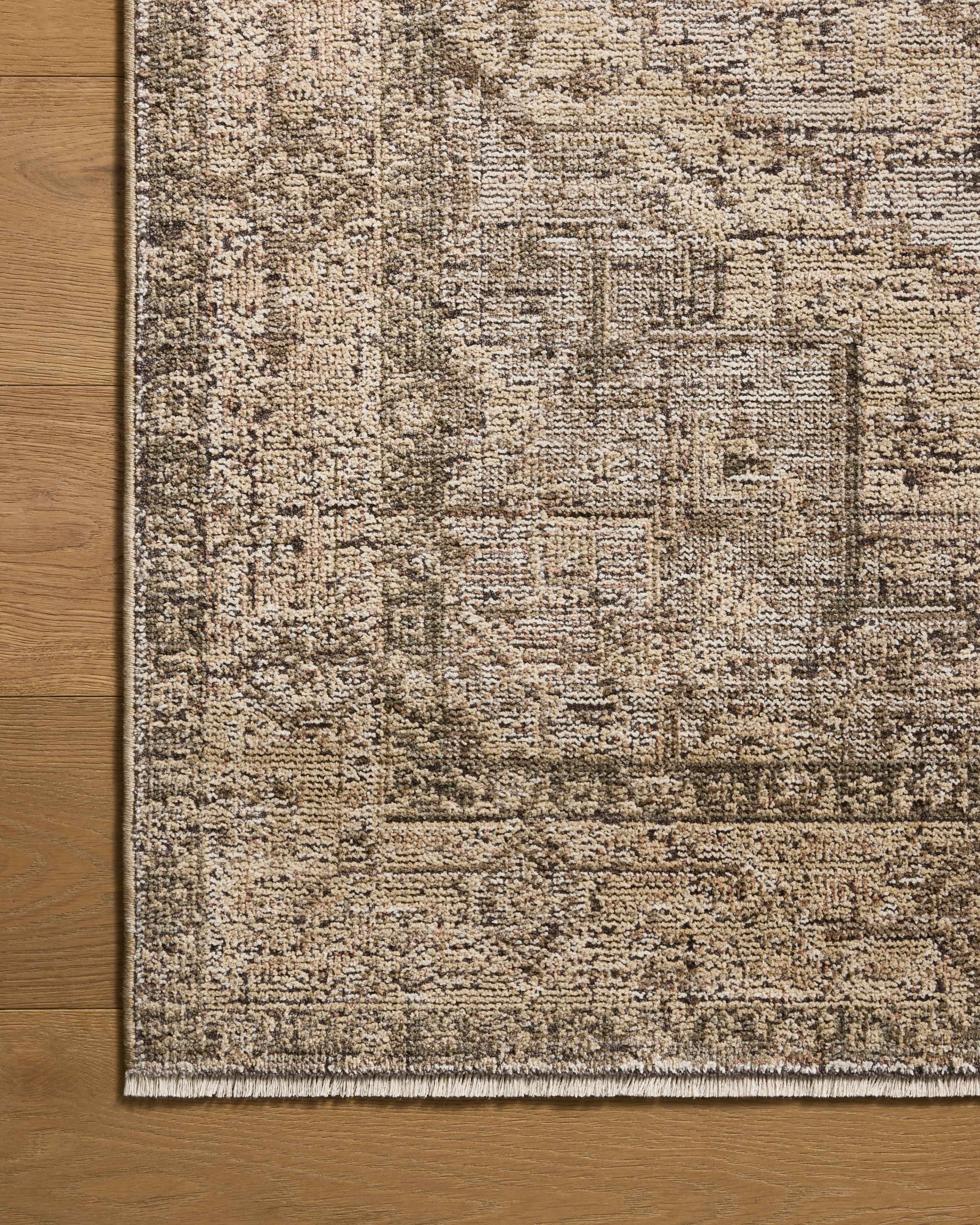 With warm beige and earthy hues and vintage styling, the Priscilla PRL-07 Beige / Earth Area Rug is a power-loomed 100% polyester area rug that elevates any room