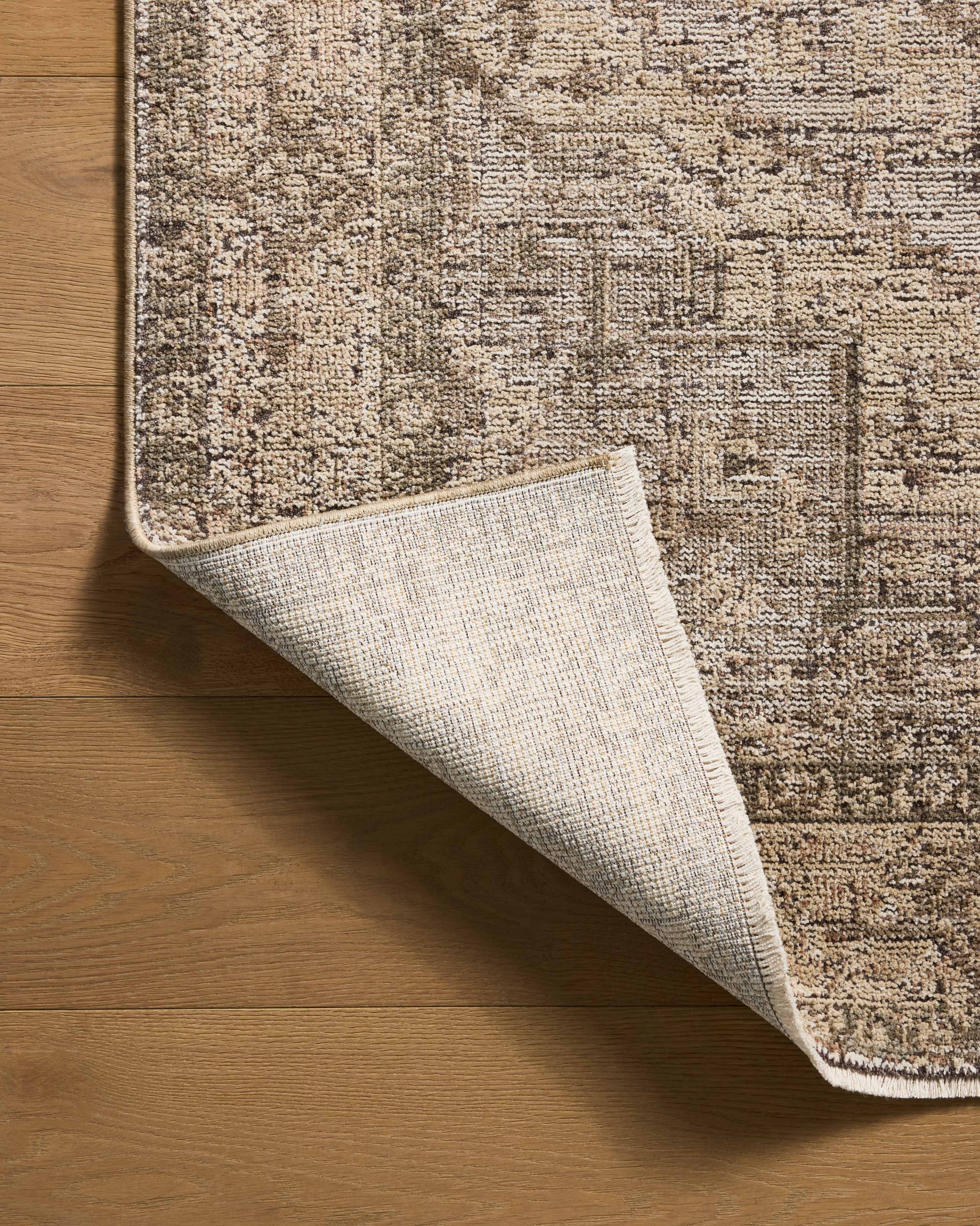 With warm beige and earthy hues and vintage styling, the Priscilla PRL-07 Beige / Earth Area Rug is a power-loomed 100% polyester area rug that elevates any room