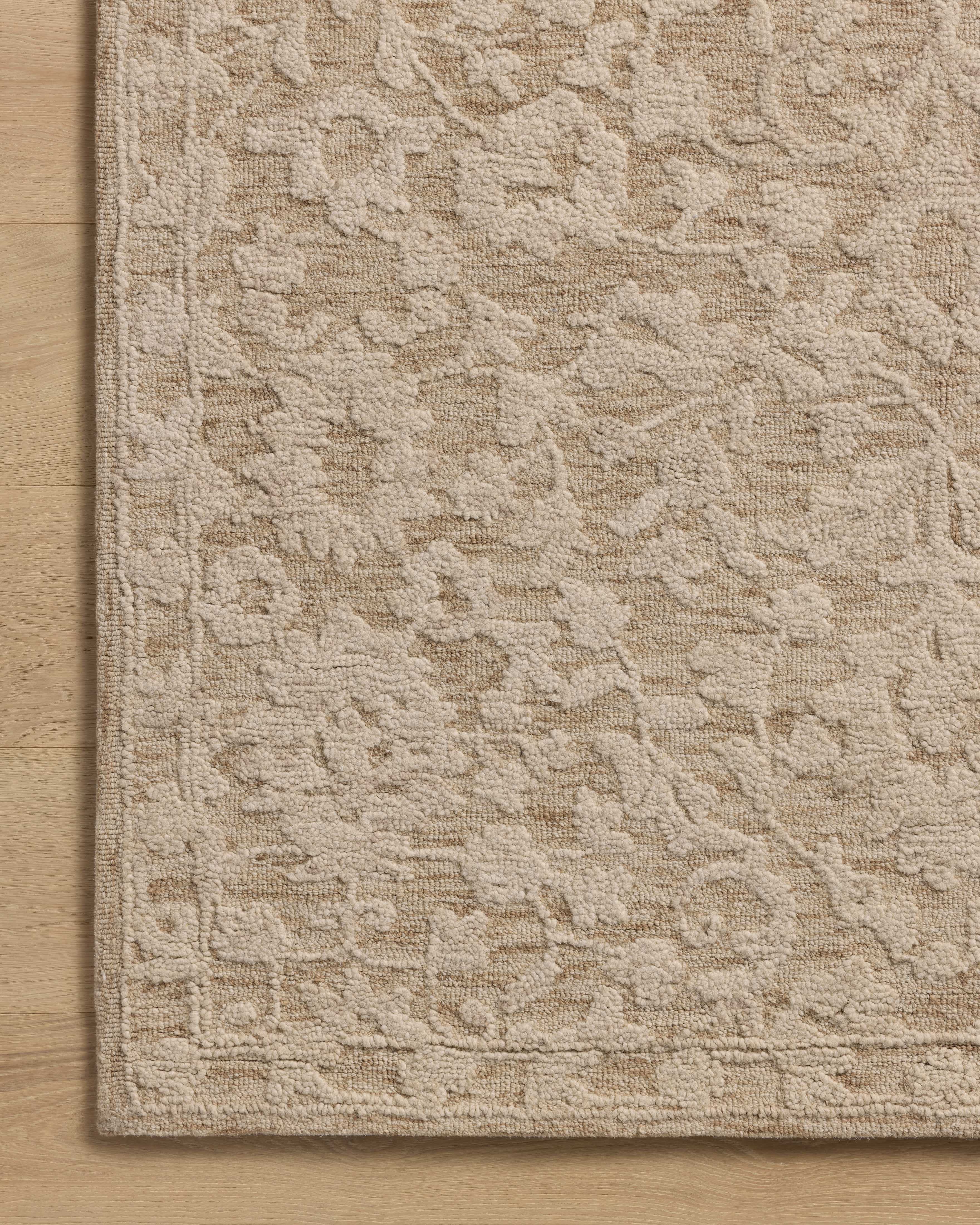 The Prudence PRU-01 Clay / Ivory Area Rug showcases earthy clay and refined ivory tones in a hand-tufted wool and cotton area rug with floral style