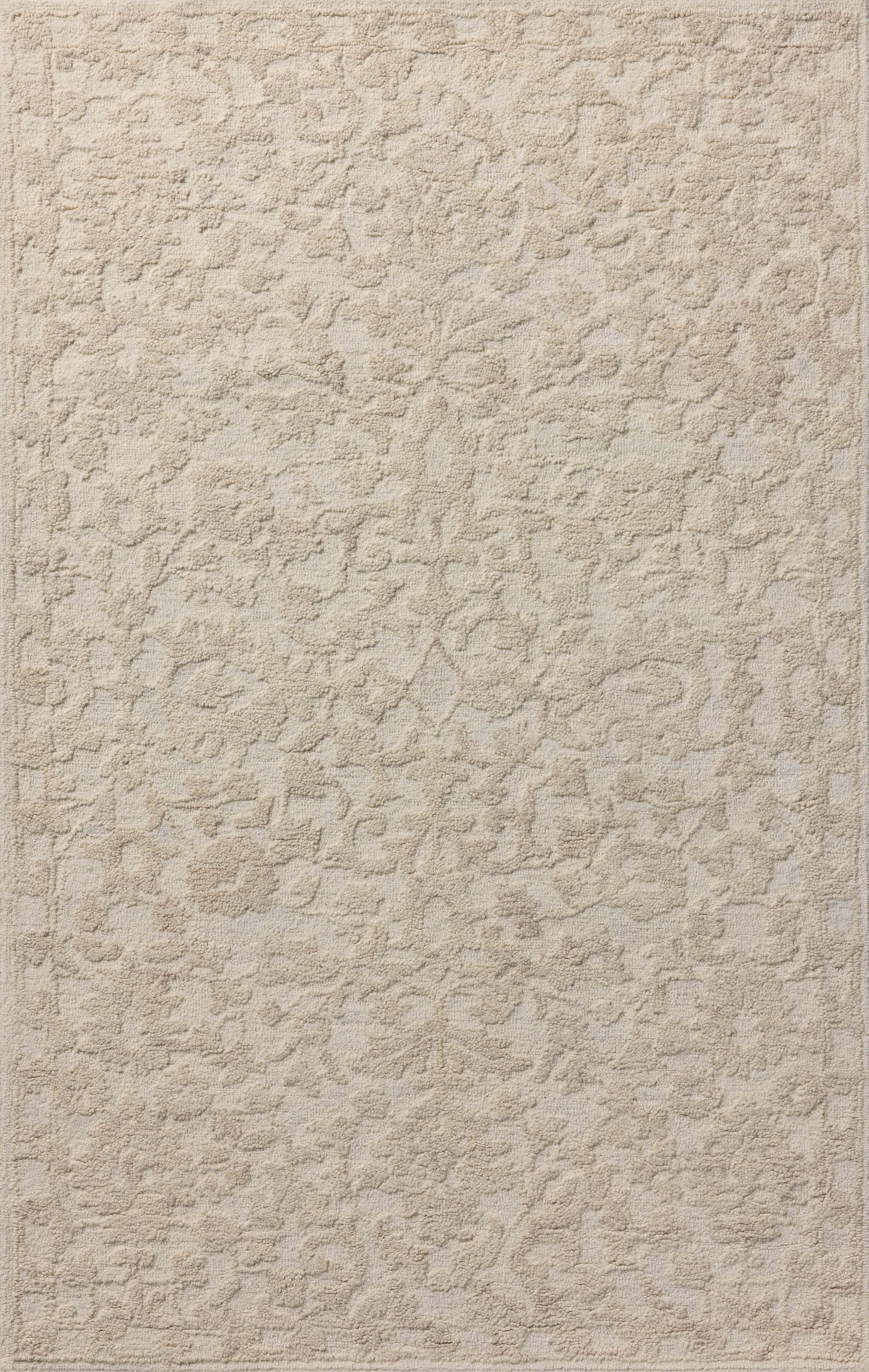 Featuring soft cream and refined ivory hues and floral detail, the Prudence PRU-01 Cream / Ivory Area Rug is a hand-tufted wool and cotton area rug for any room