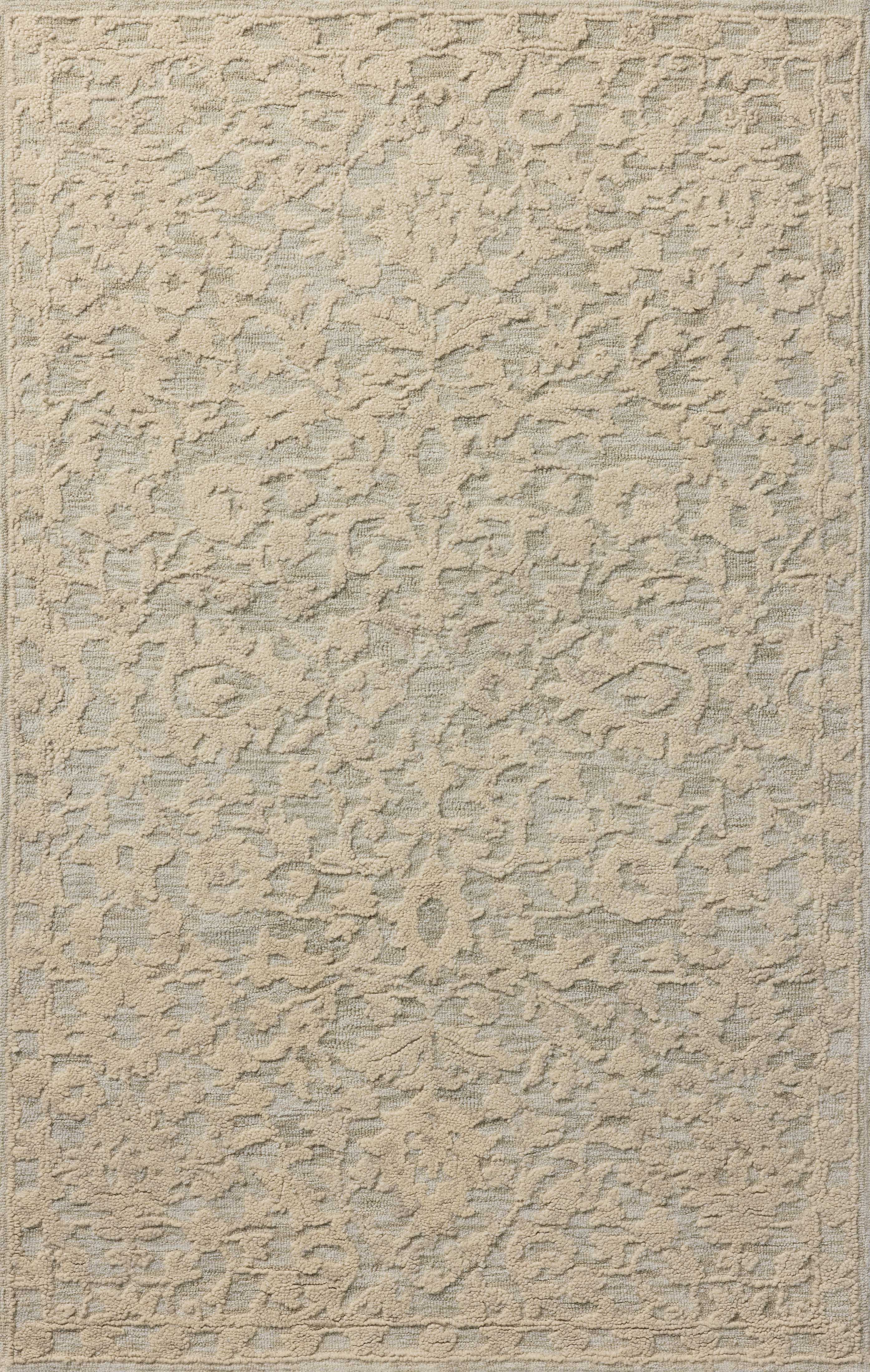 The Prudence PRU-01 Sage / Ivory Area Rug pairs calming sage and refined ivory tones and floral patterns in a hand-tufted wool and cotton area rug