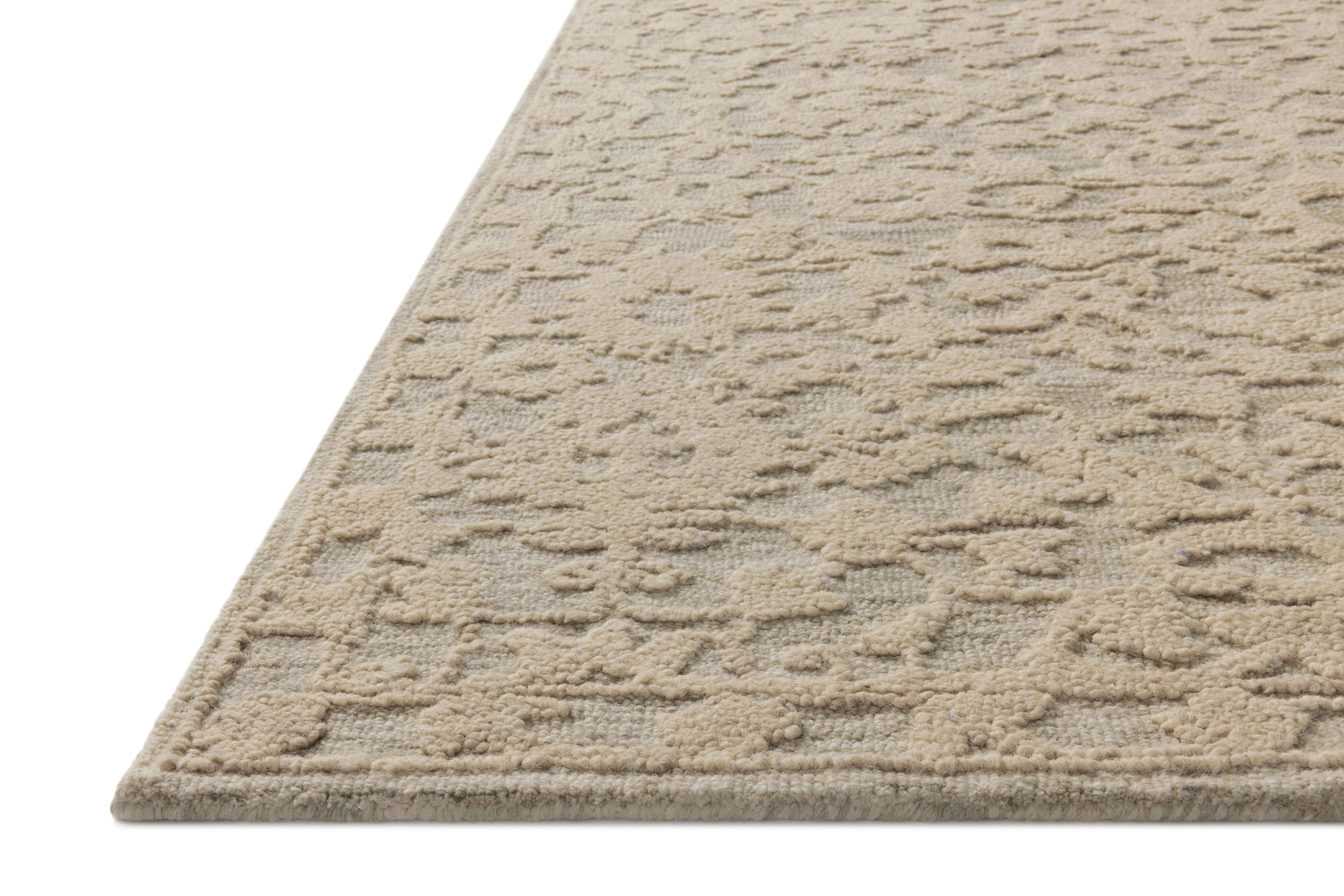 The Prudence PRU-01 Sage / Ivory Area Rug pairs calming sage and refined ivory tones and floral patterns in a hand-tufted wool and cotton area rug