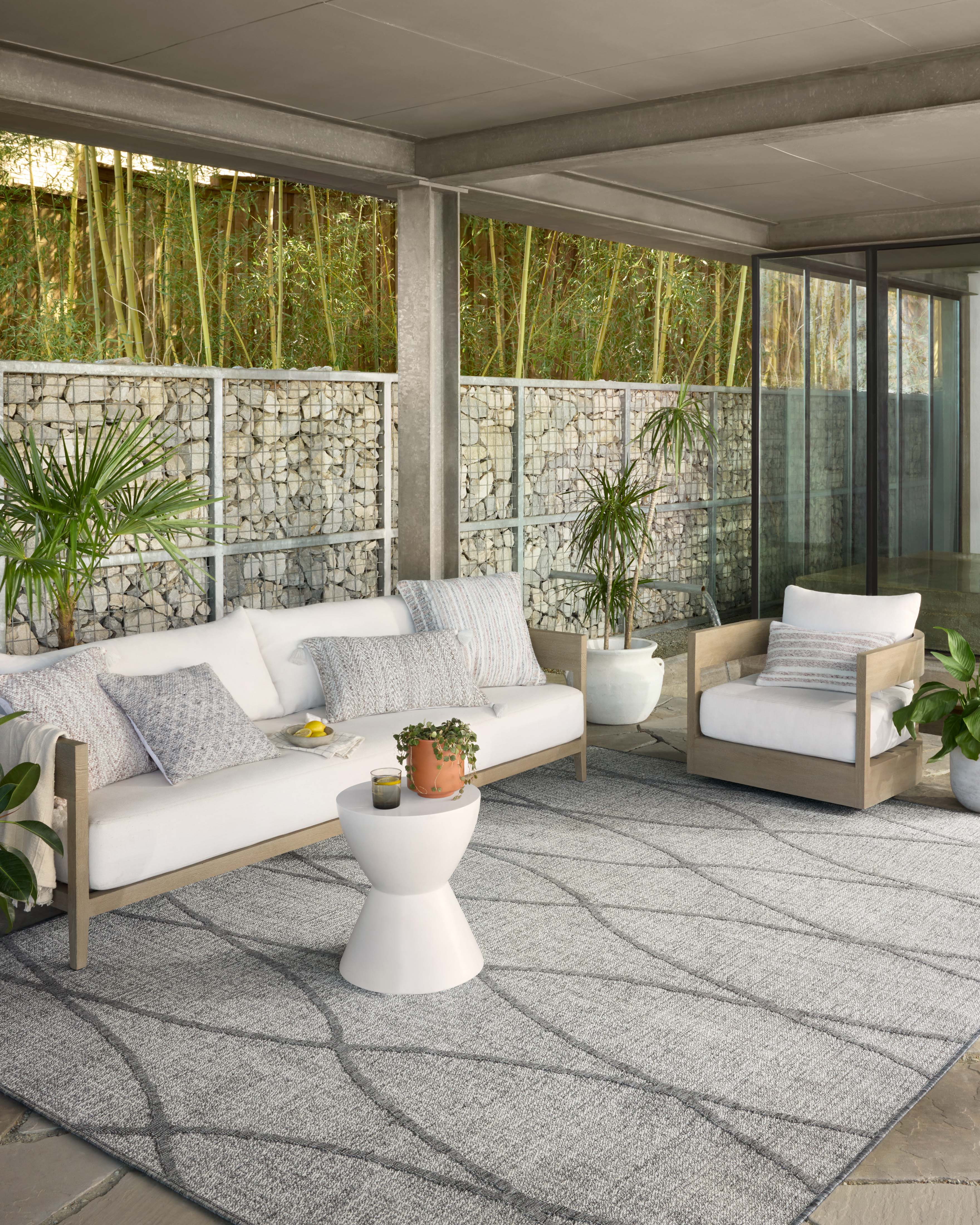 Rainier RAI-07 Dove and grey modern indoor outdoor area rug, soft neutral hues, durable polypropylene.