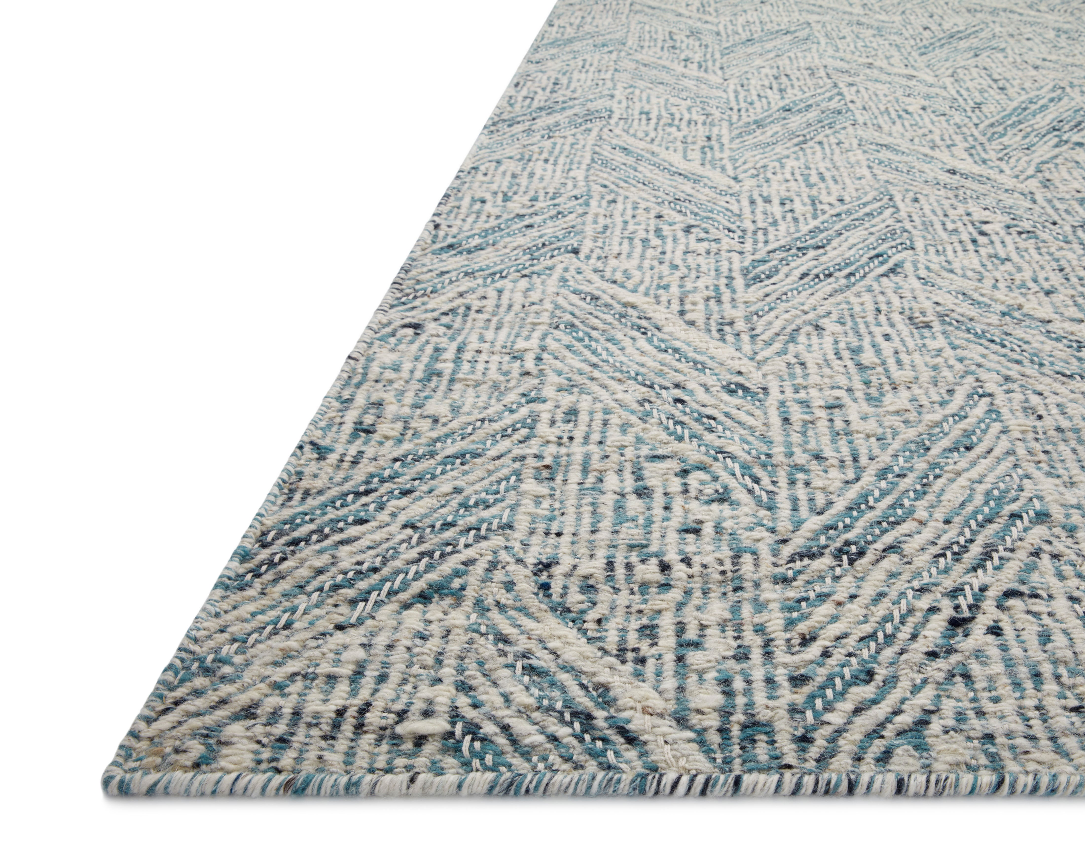 Raven RAV-01 Blue / Ivory Area Rug – Handwoven blue and ivory rug with layered geometric patterns, crafted from wool and cotton in India. GoodWeave certified for ethical production.