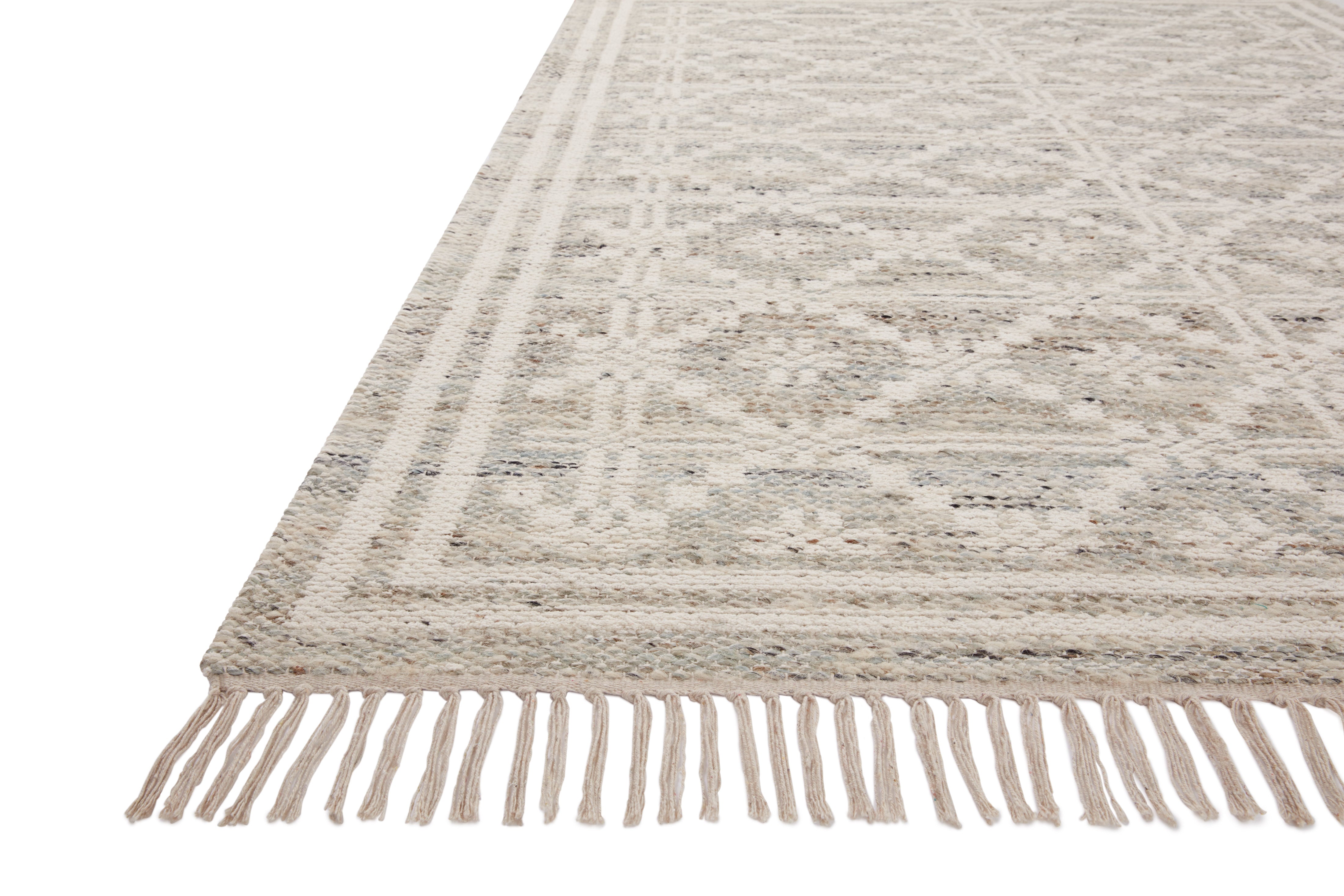 Rivers RIV-02 Area Rug with a reversible flatweave construction, symmetrical motifs, and lagoon and ivory hues for a fresh, natural look in contemporary interiors.