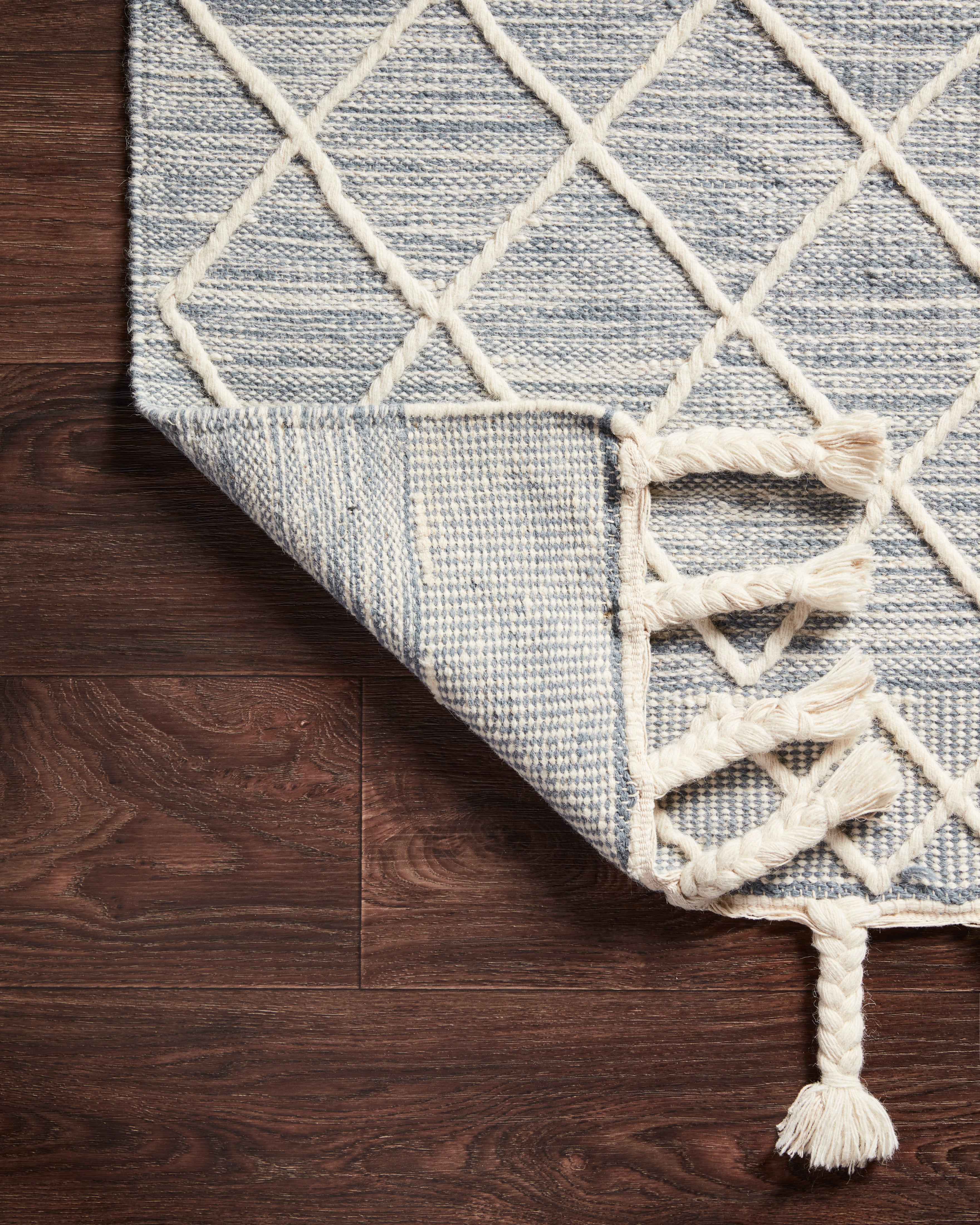 Sawyer SAW-04 Teal Area Rug showcasing bold graphic design and fringe