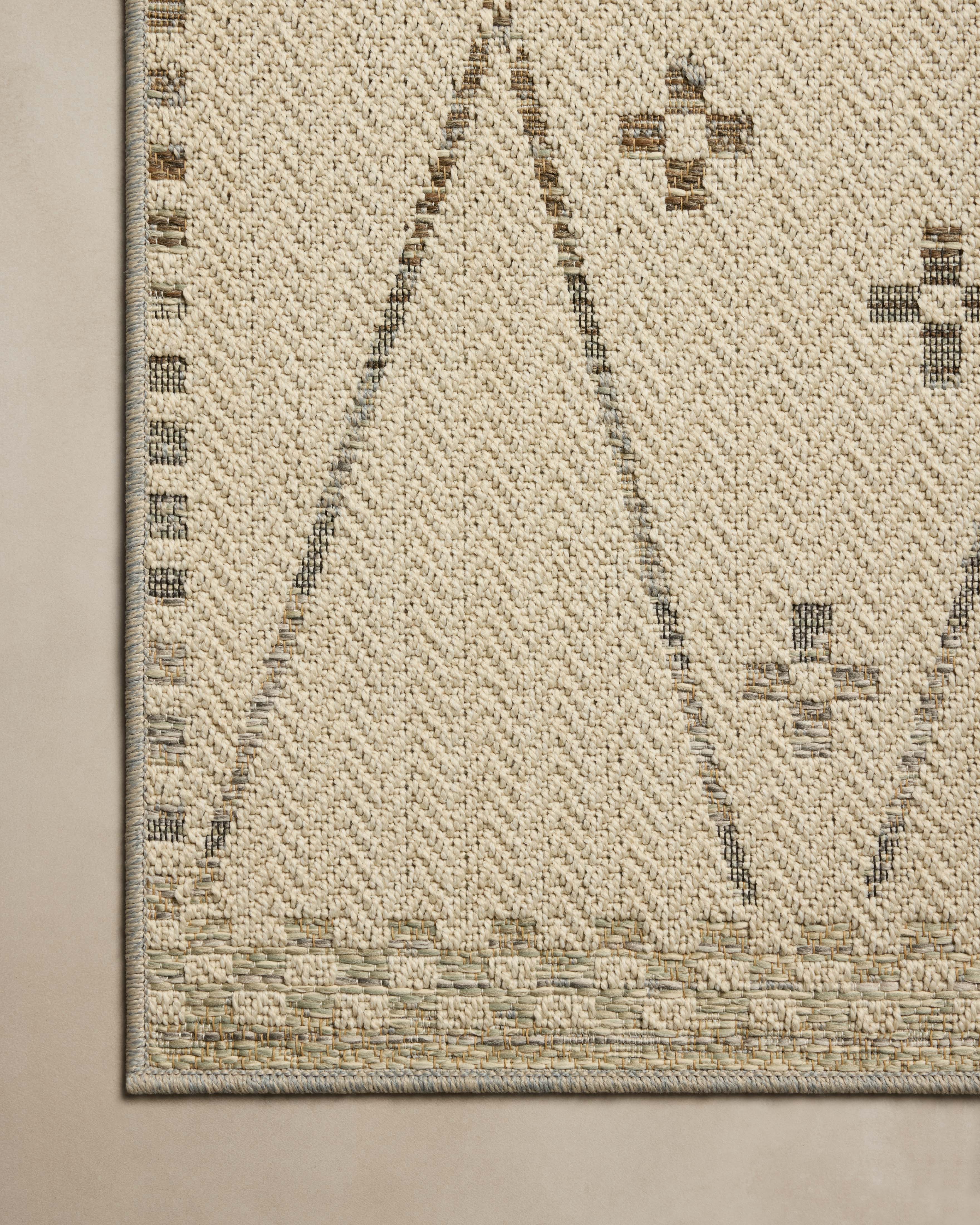 A stunning power-loomed polypropylene area rug, the Saylor SAY-01 Ivory / Pebble Area Rug features refined ivory and subtle pebble tones for a polished look