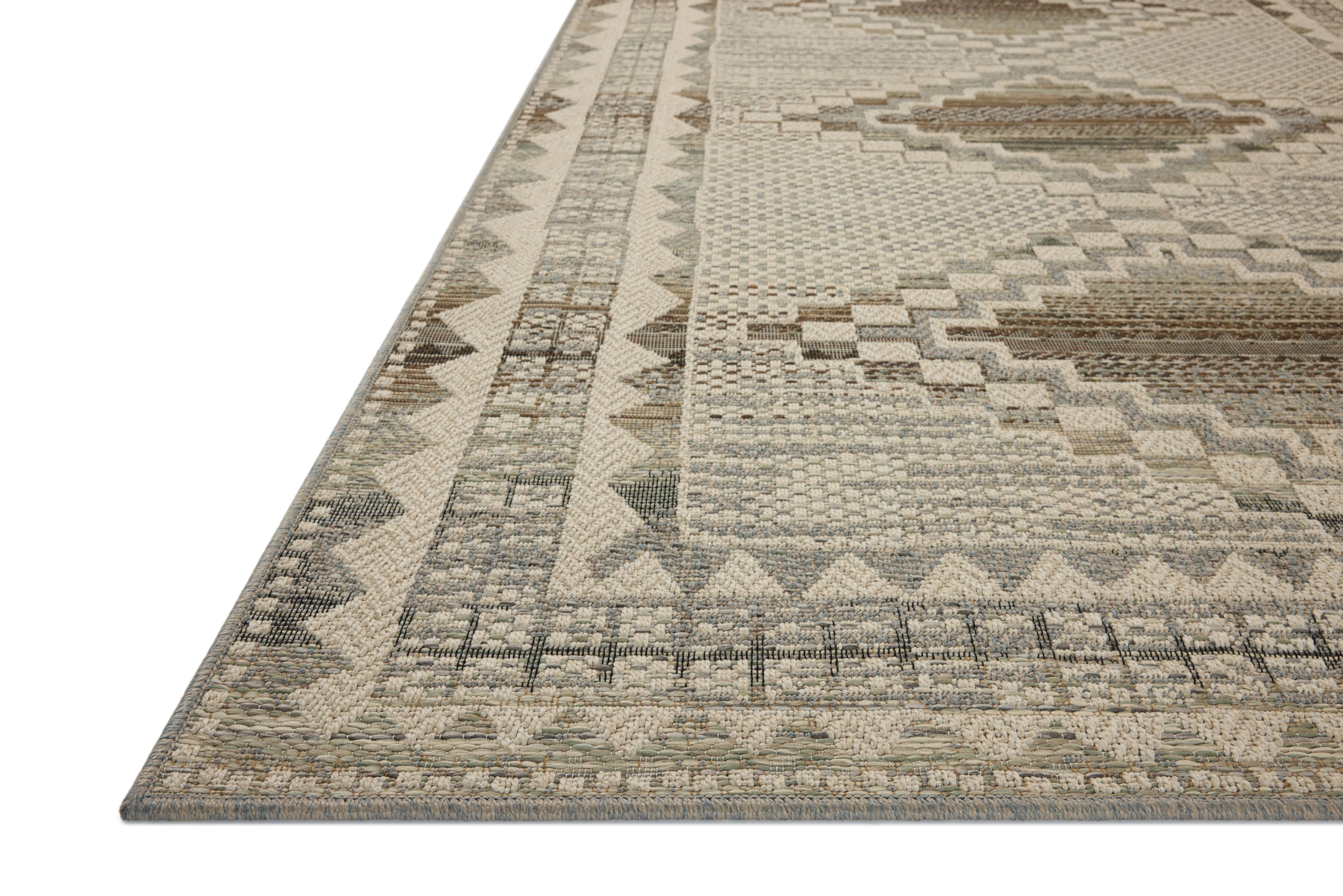 The Saylor SAY-02 Ivory / Granite Area Rug delivers refined ivory and striking granite beauty in a power-loomed polypropylene area rug