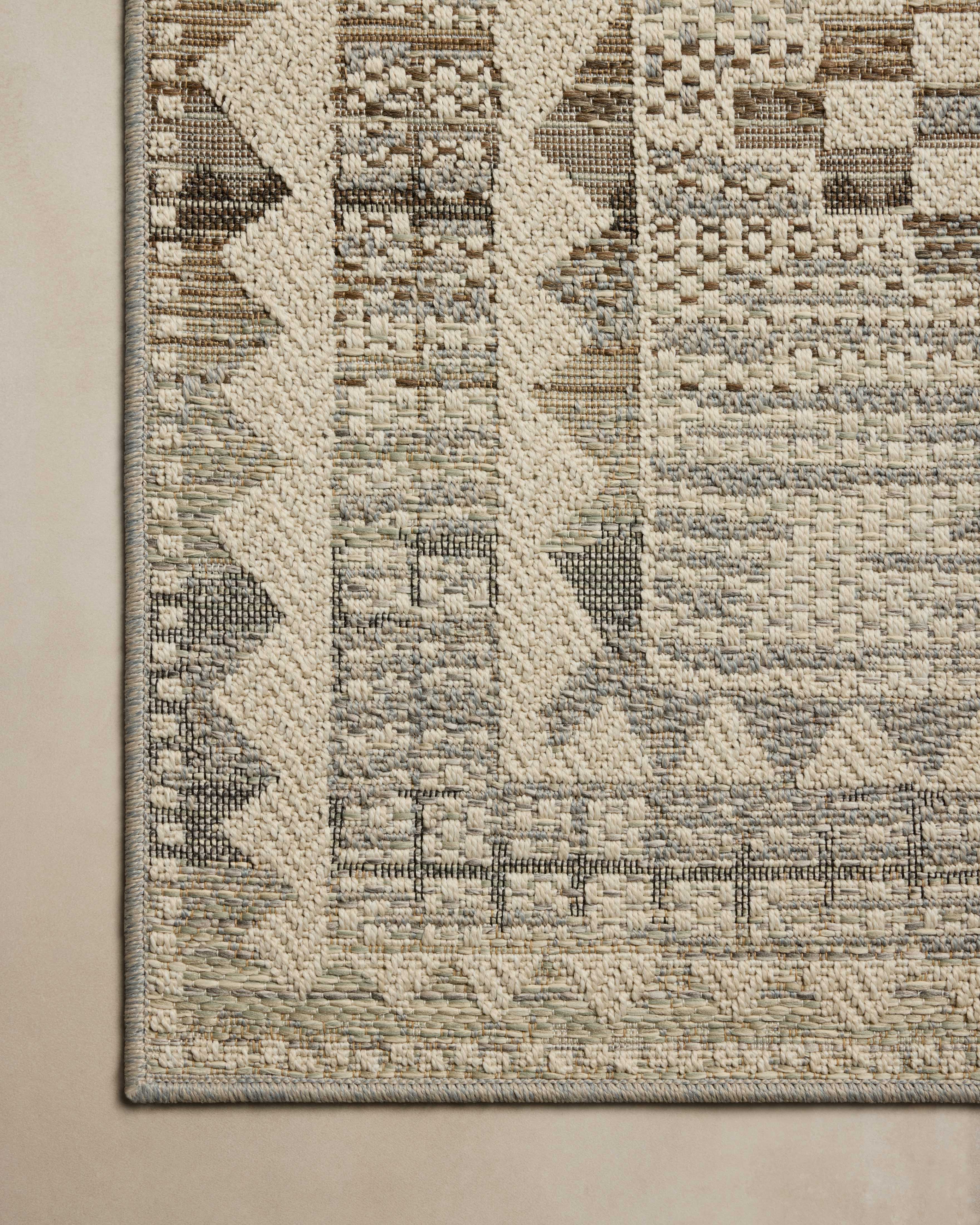 The Saylor SAY-02 Ivory / Granite Area Rug delivers refined ivory and striking granite beauty in a power-loomed polypropylene area rug