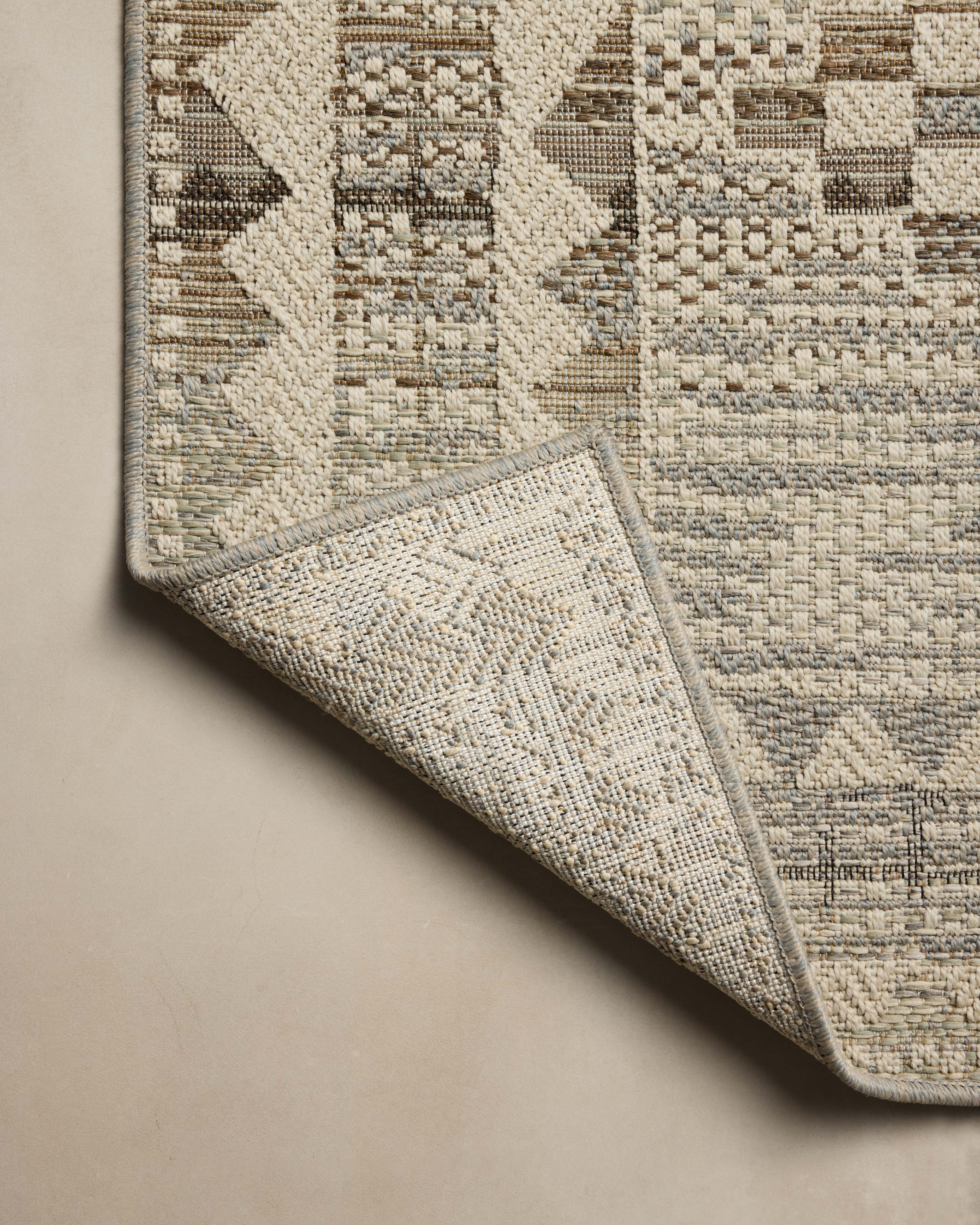 The Saylor SAY-02 Ivory / Granite Area Rug delivers refined ivory and striking granite beauty in a power-loomed polypropylene area rug