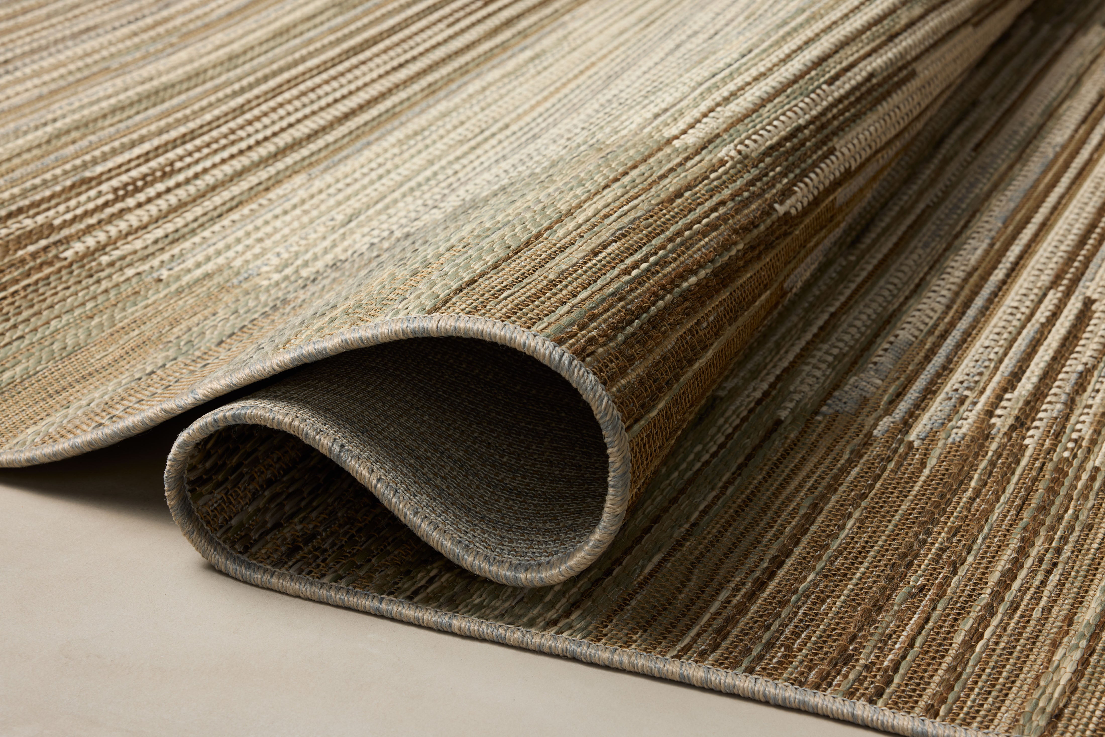 Designed in earthy and warm natural hues, the Saylor SAY-03 Earth / Natural Area Rug is a power-loomed polypropylene area rug that stands out
